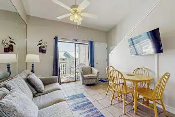 Gulf front condo with onsite snack bar, three shared pools, and internet