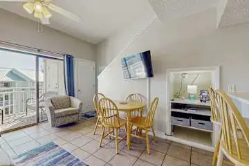 Gulf front condo with onsite snack bar, three shared pools, and internet