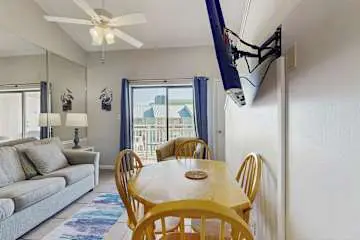 Gulf front condo with onsite snack bar, three shared pools, and internet