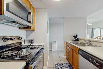 Gulf front condo with onsite snack bar, three shared pools, and internet