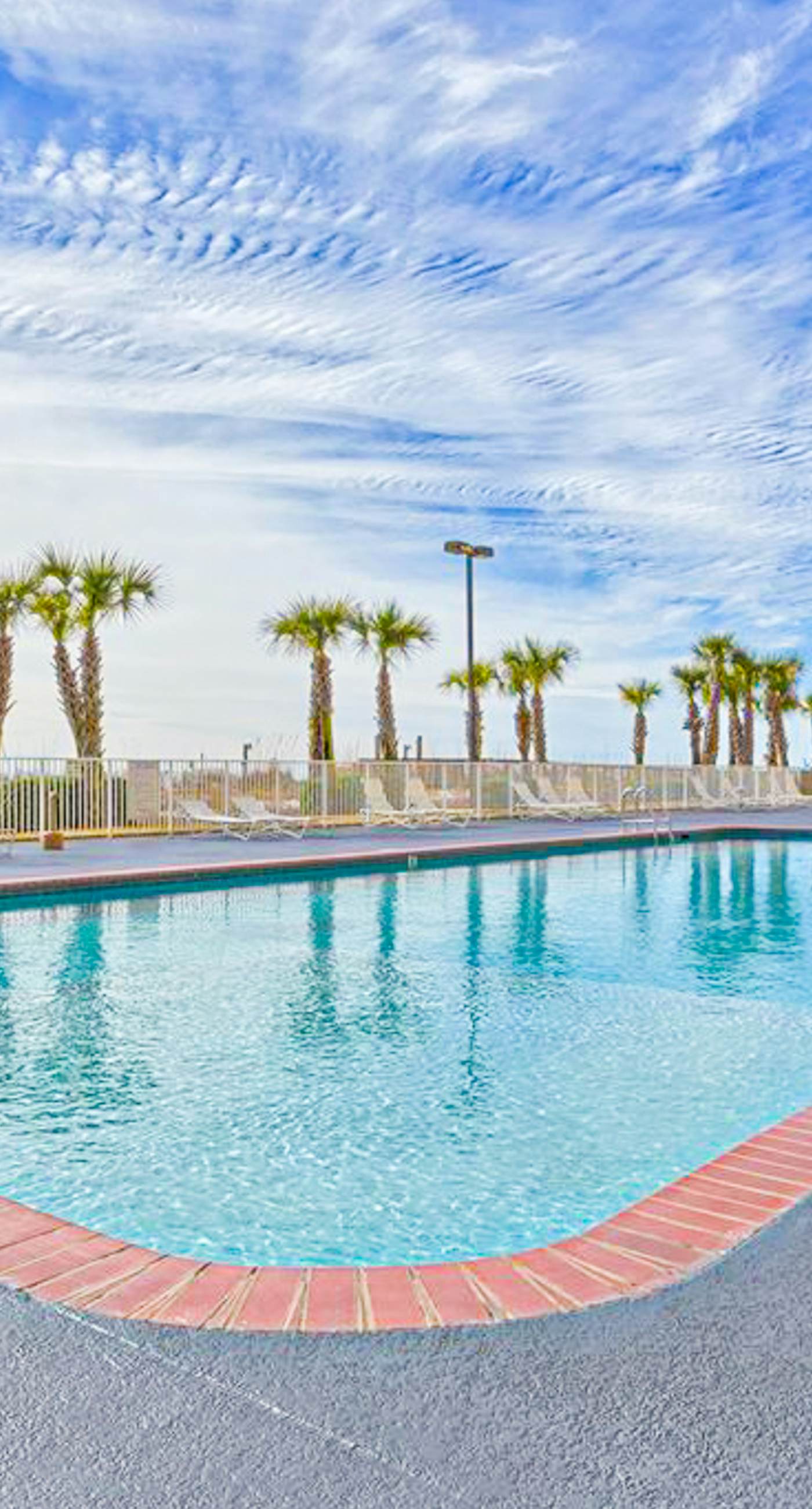 Gulf-front condo with pools, hot tubs, sauna, gym, central AC & washer/dryer