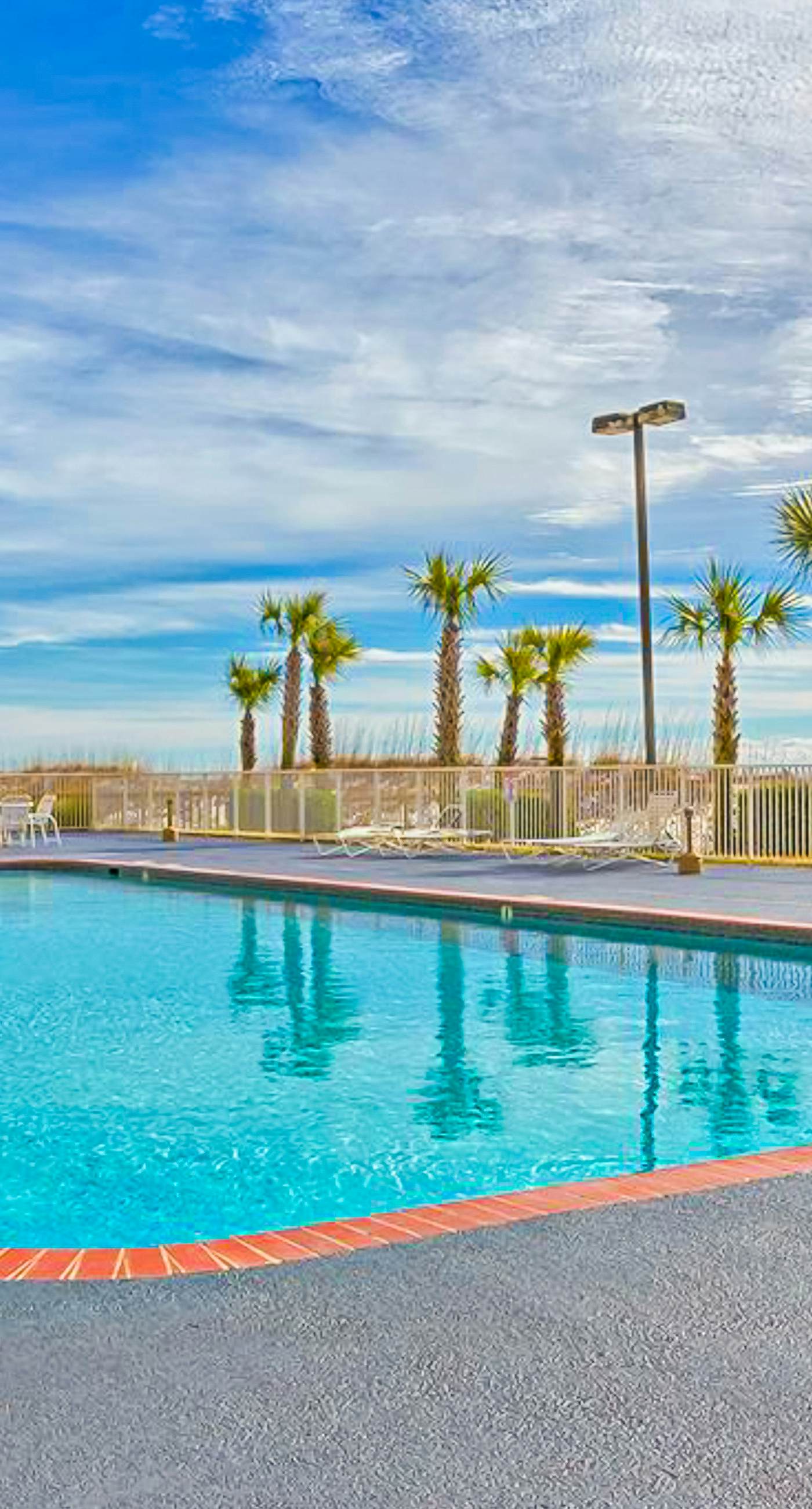 Gulf-front condo with pools, hot tubs, sauna, gym, central AC & washer/dryer