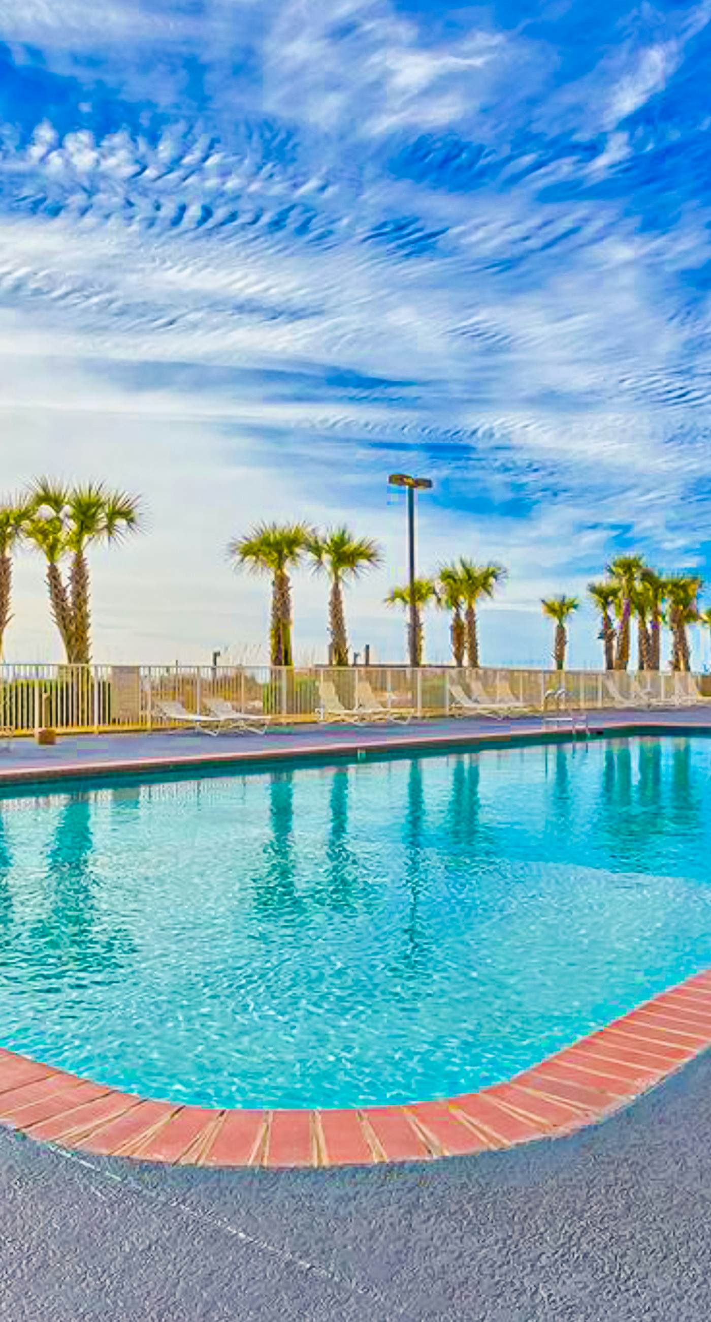 Gulf-front condo with pools, hot tubs, sauna, gym, central AC & washer/dryer