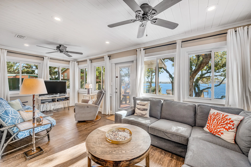 Charming bay front home with WiFi, central AC, balcony, & deck