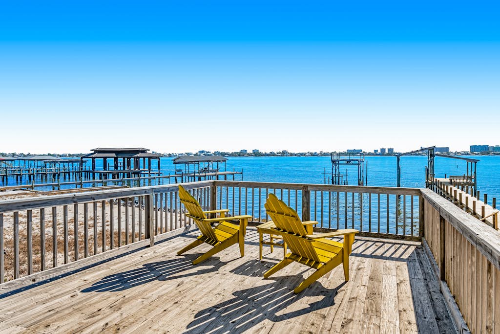 Charming bay front home with WiFi, central AC, balcony, & deck