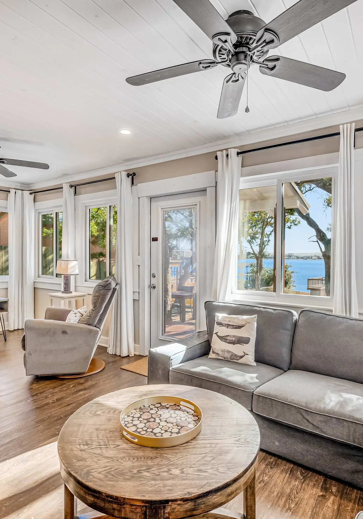 Charming bay front home with WiFi, central AC, balcony, & deck