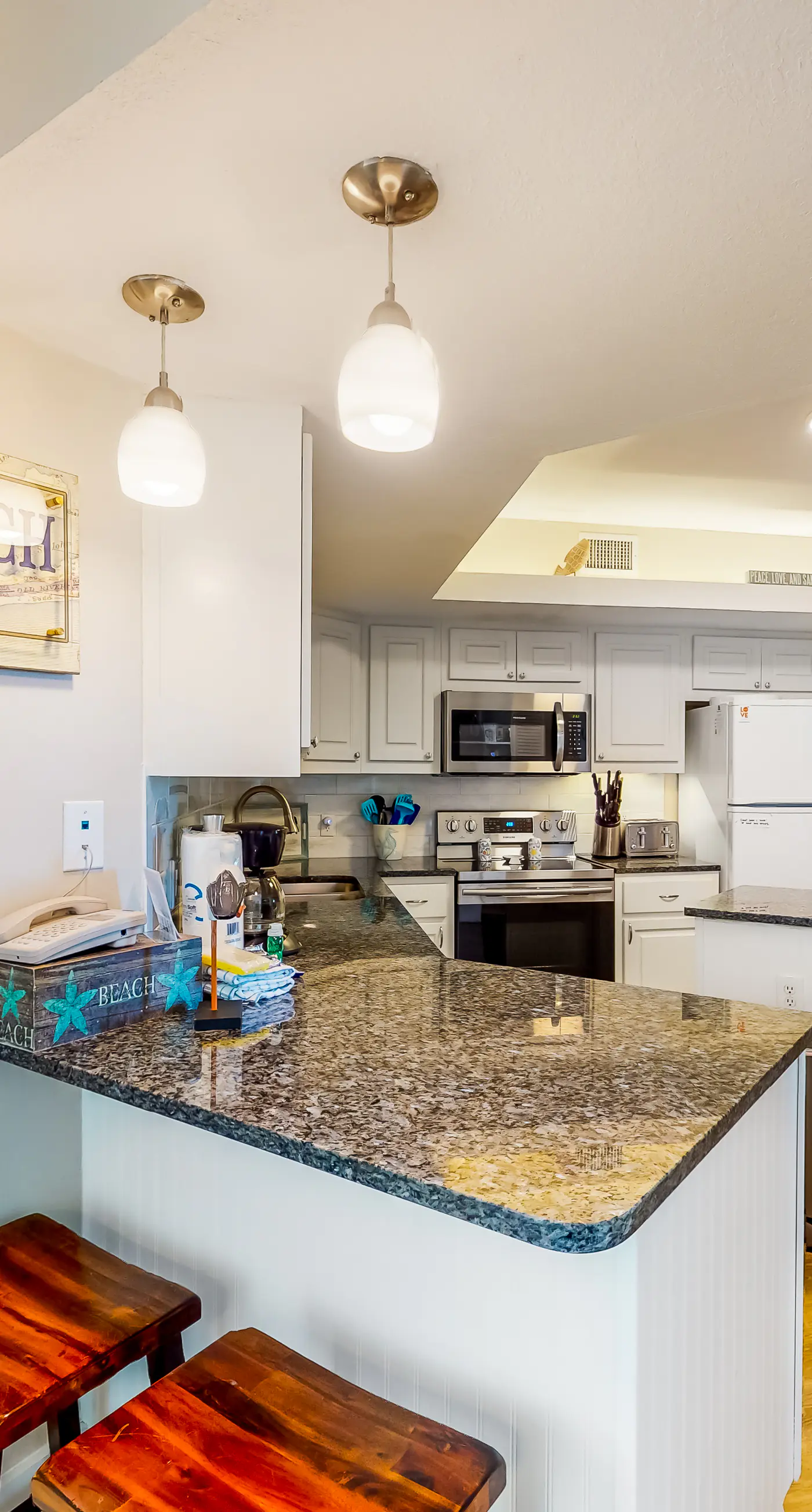 Dreamy beach condo with water views, balcony, pool & beach access