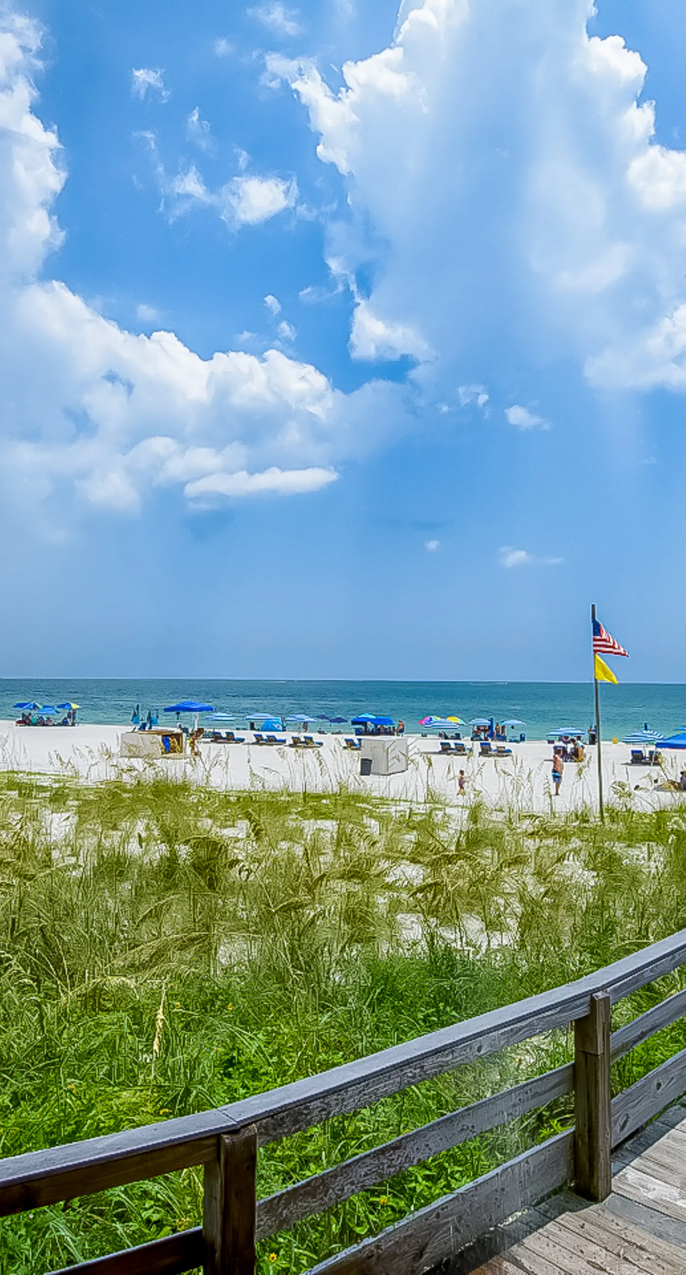 Dreamy beach condo with water views, balcony, pool & beach access