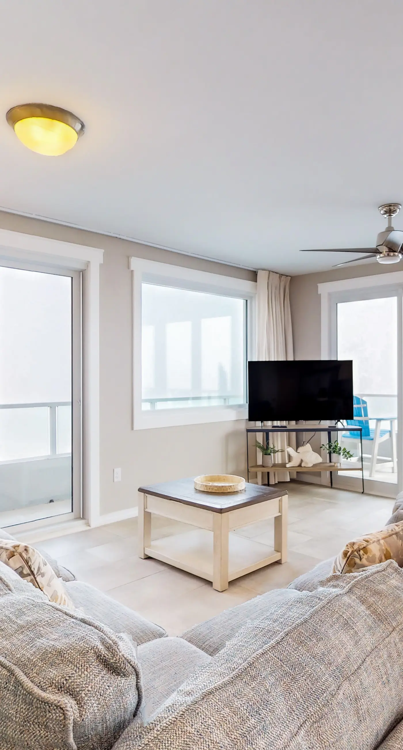 Beachfront corner condo with Gulf-view balcony, pool & beach access