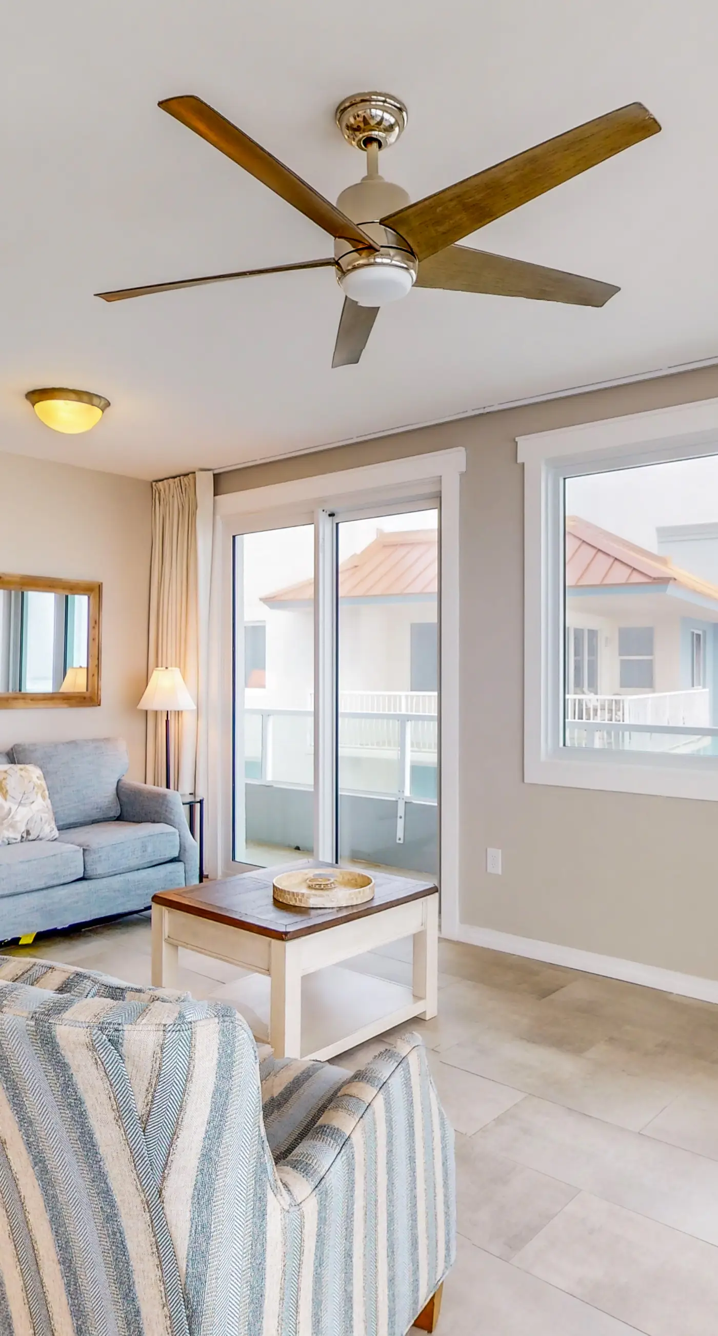 Beachfront corner condo with Gulf-view balcony, pool & beach access