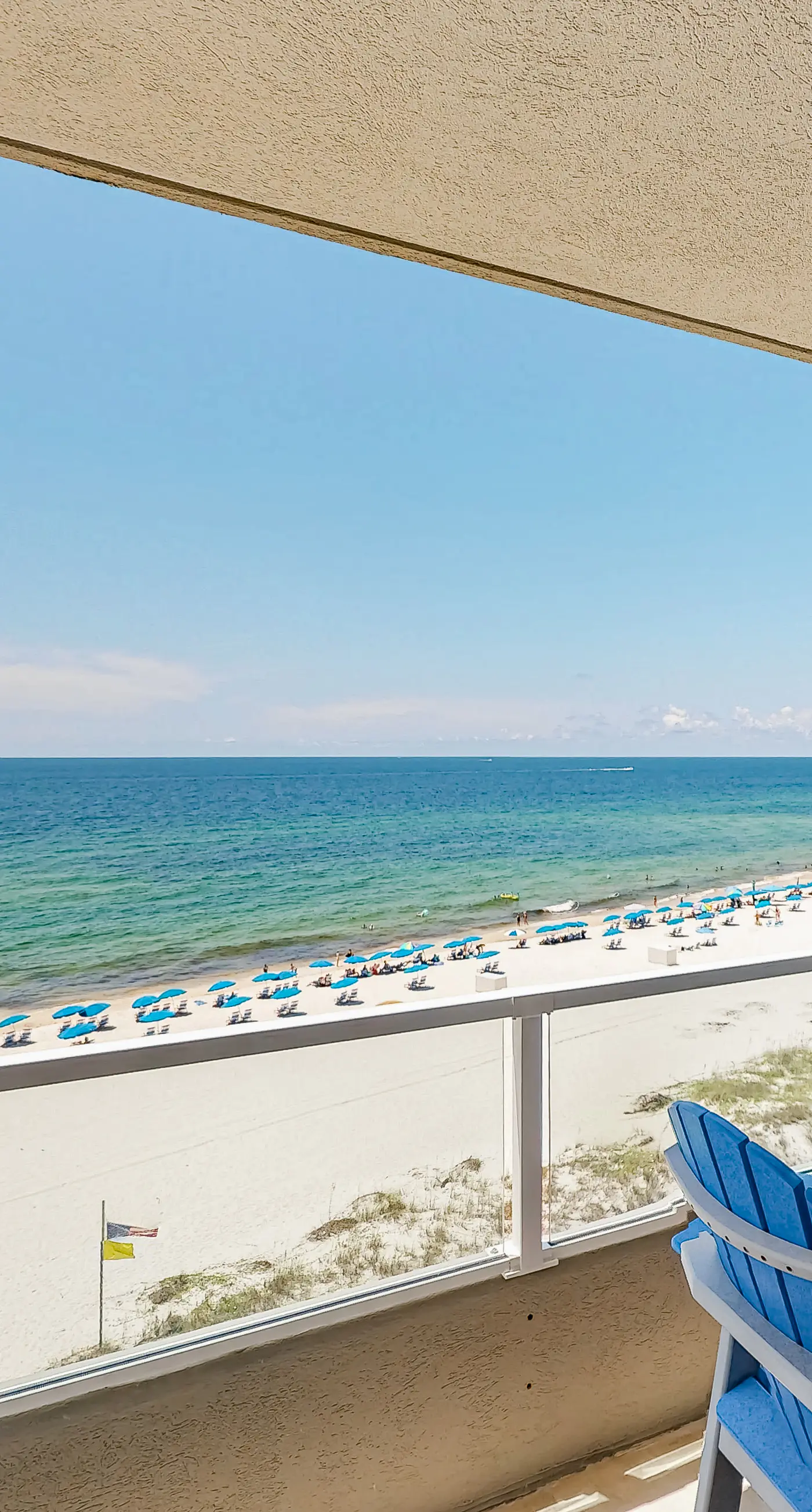 Beachfront corner condo with Gulf-view balcony, pool & beach access