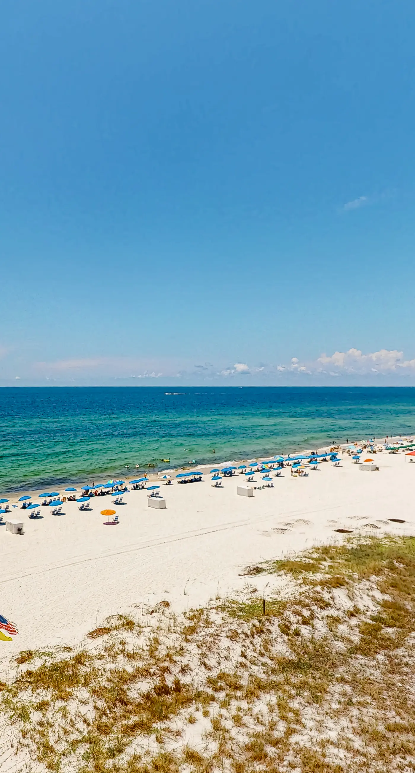 Beachfront corner condo with Gulf-view balcony, pool & beach access