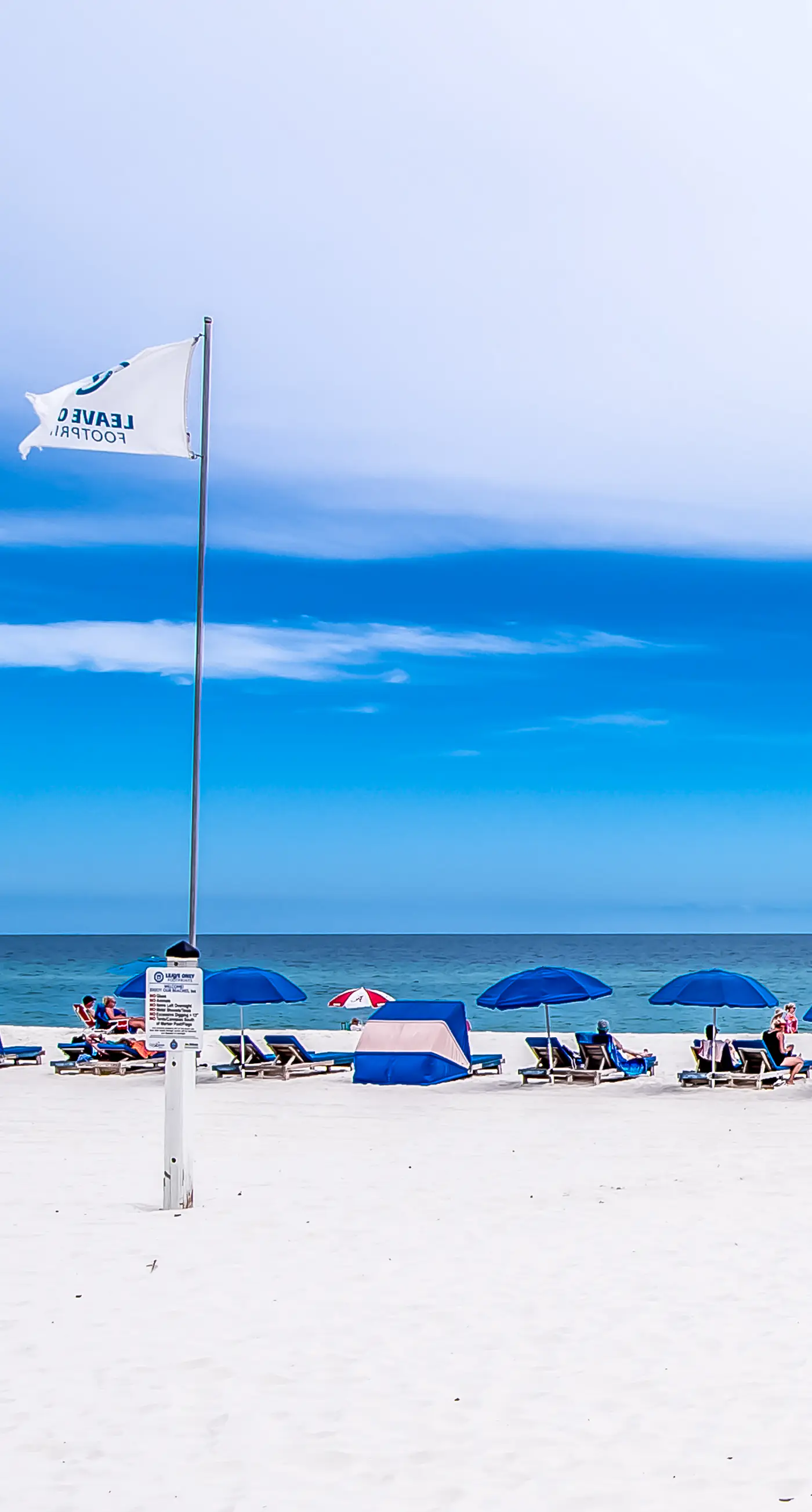 Beachfront corner condo with Gulf-view balcony, pool & beach access