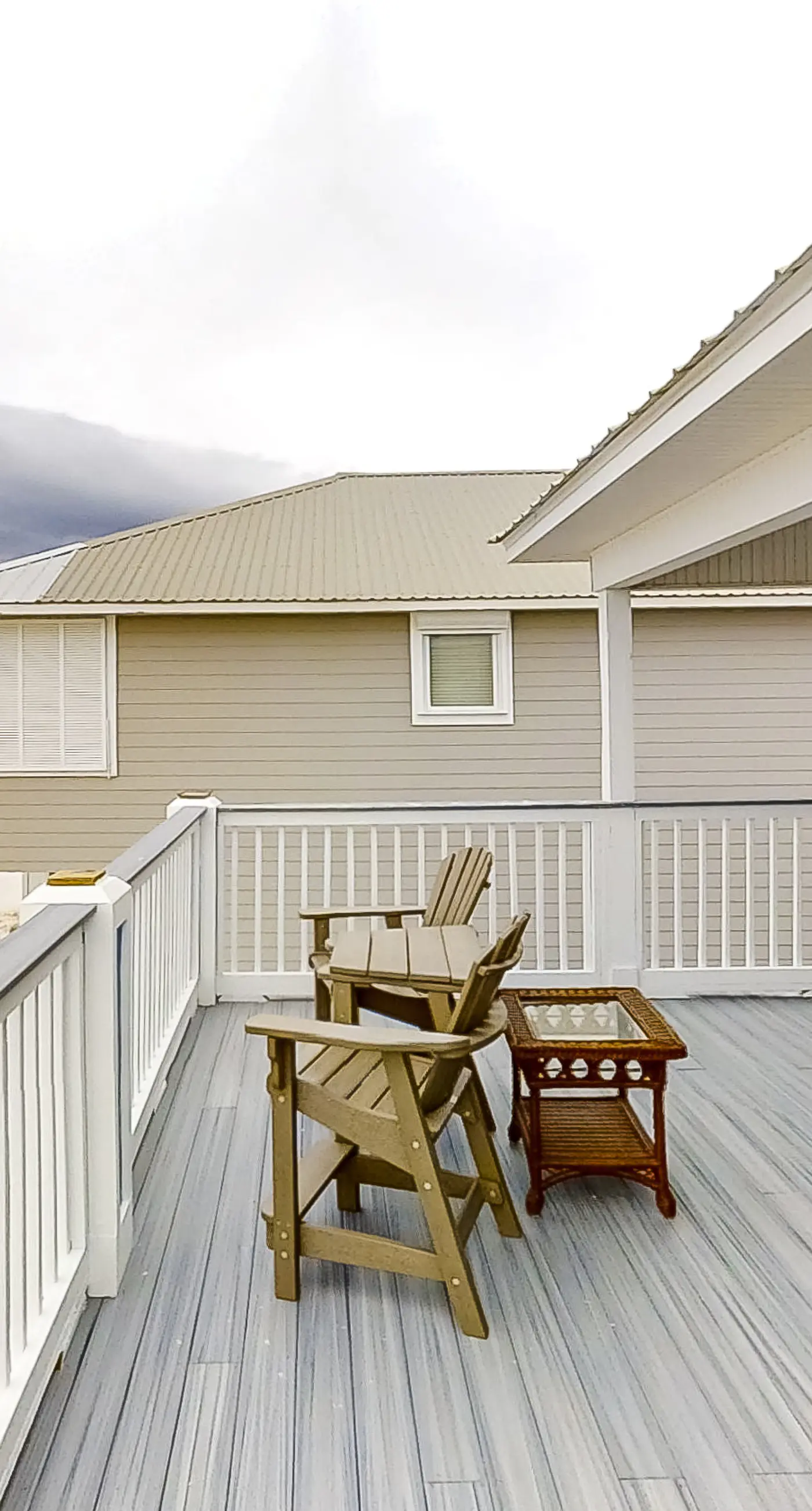 Spacious beachfront home with large balconies & pool access