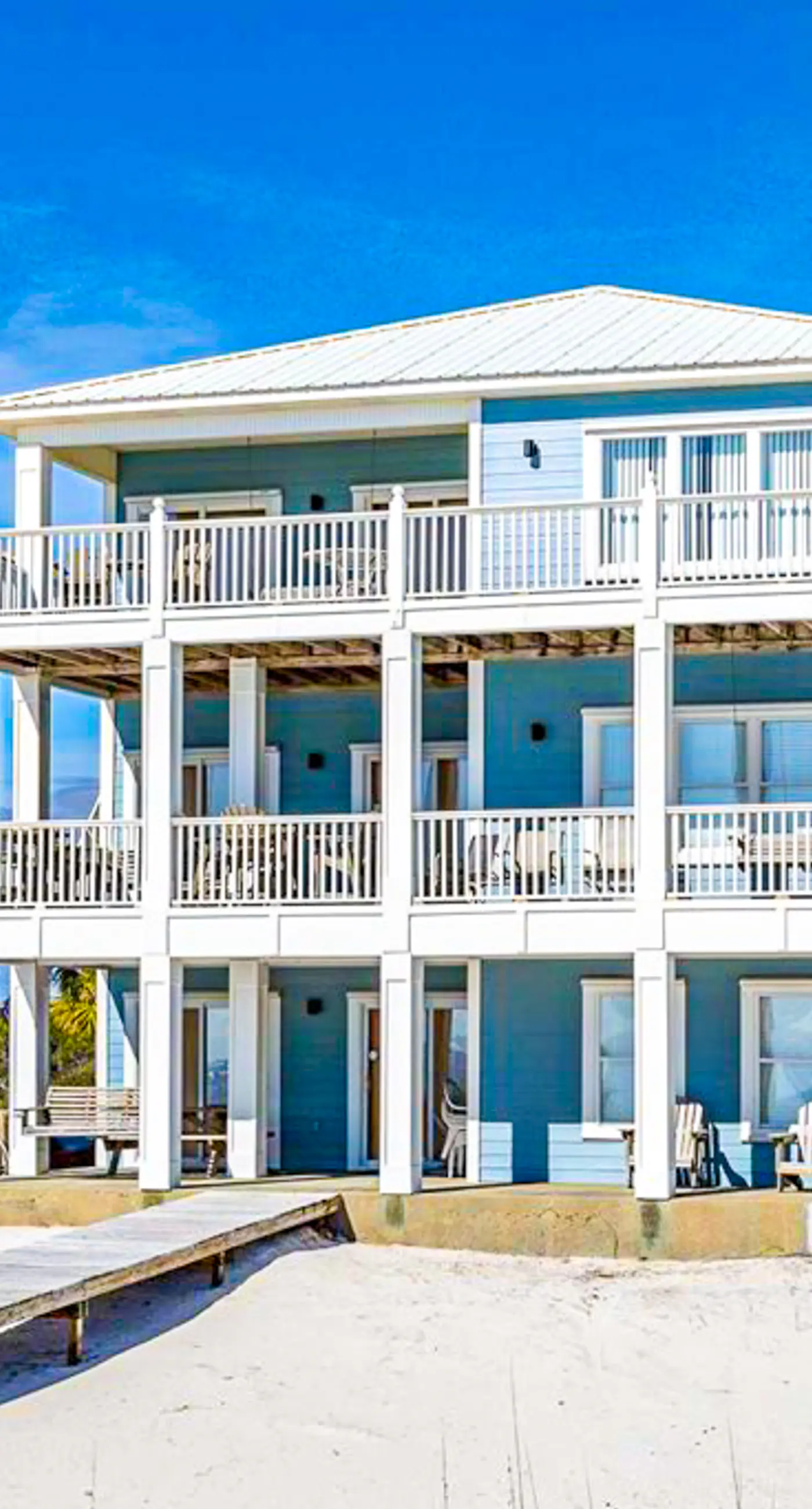 Spacious beachfront home with large balconies & pool access