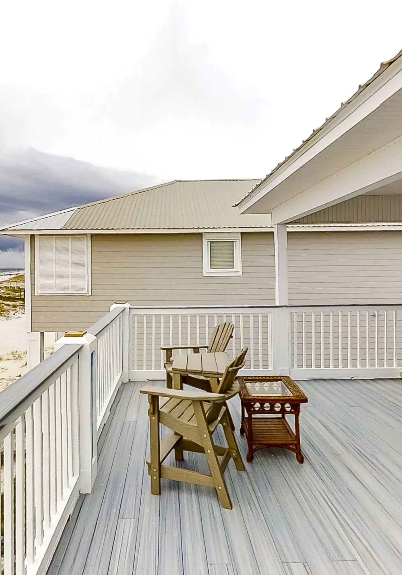 Spacious beachfront home with large balconies & pool access