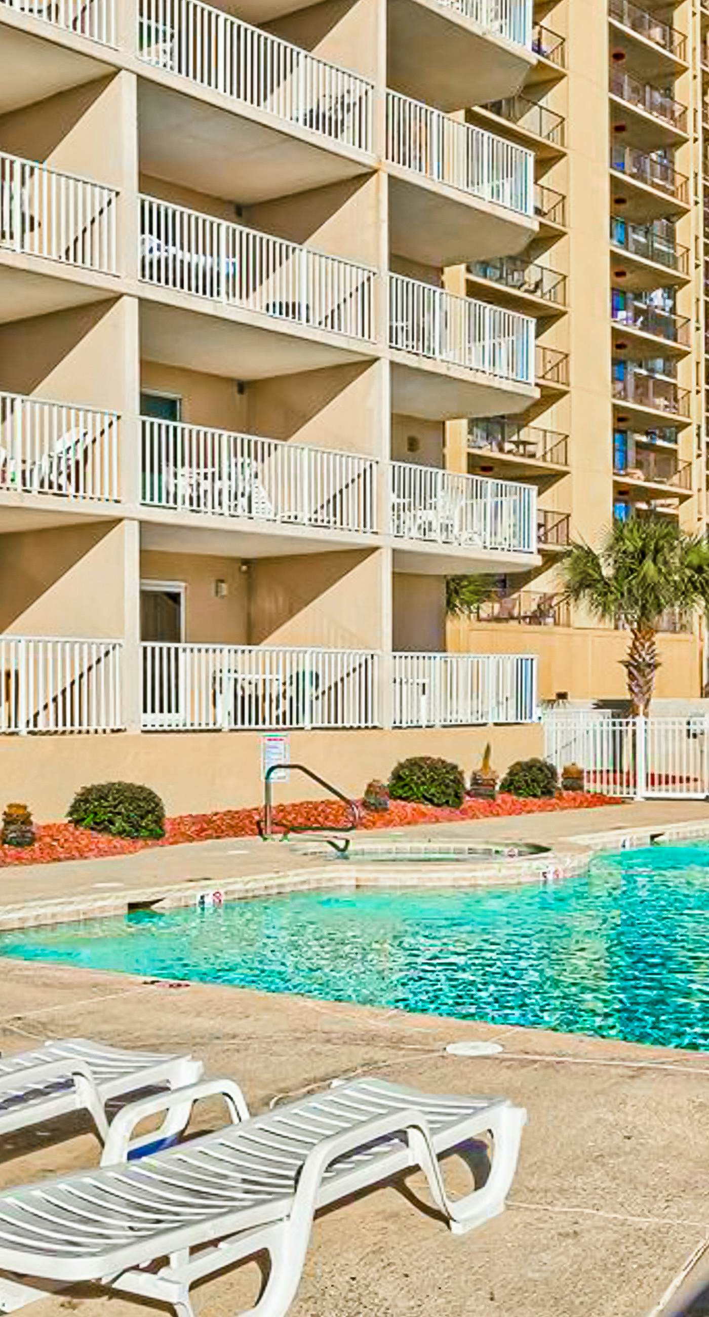 Gulf-front condo with beach access, private balcony, hot tub, pools & BBQ