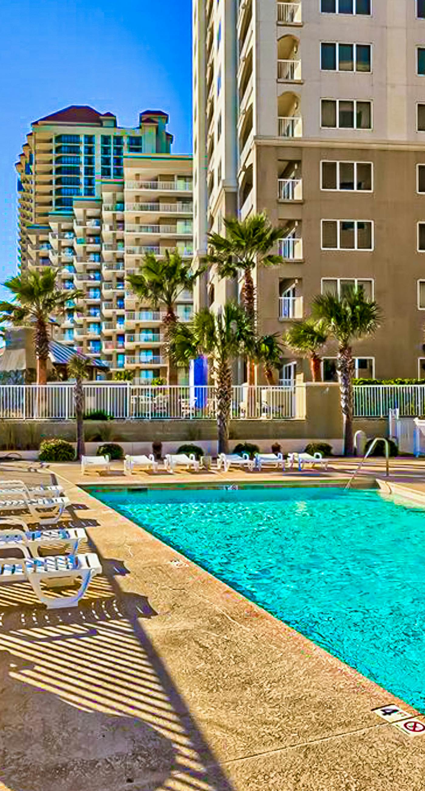 Gulf-front condo with beach access, private balcony, hot tub, pools & BBQ