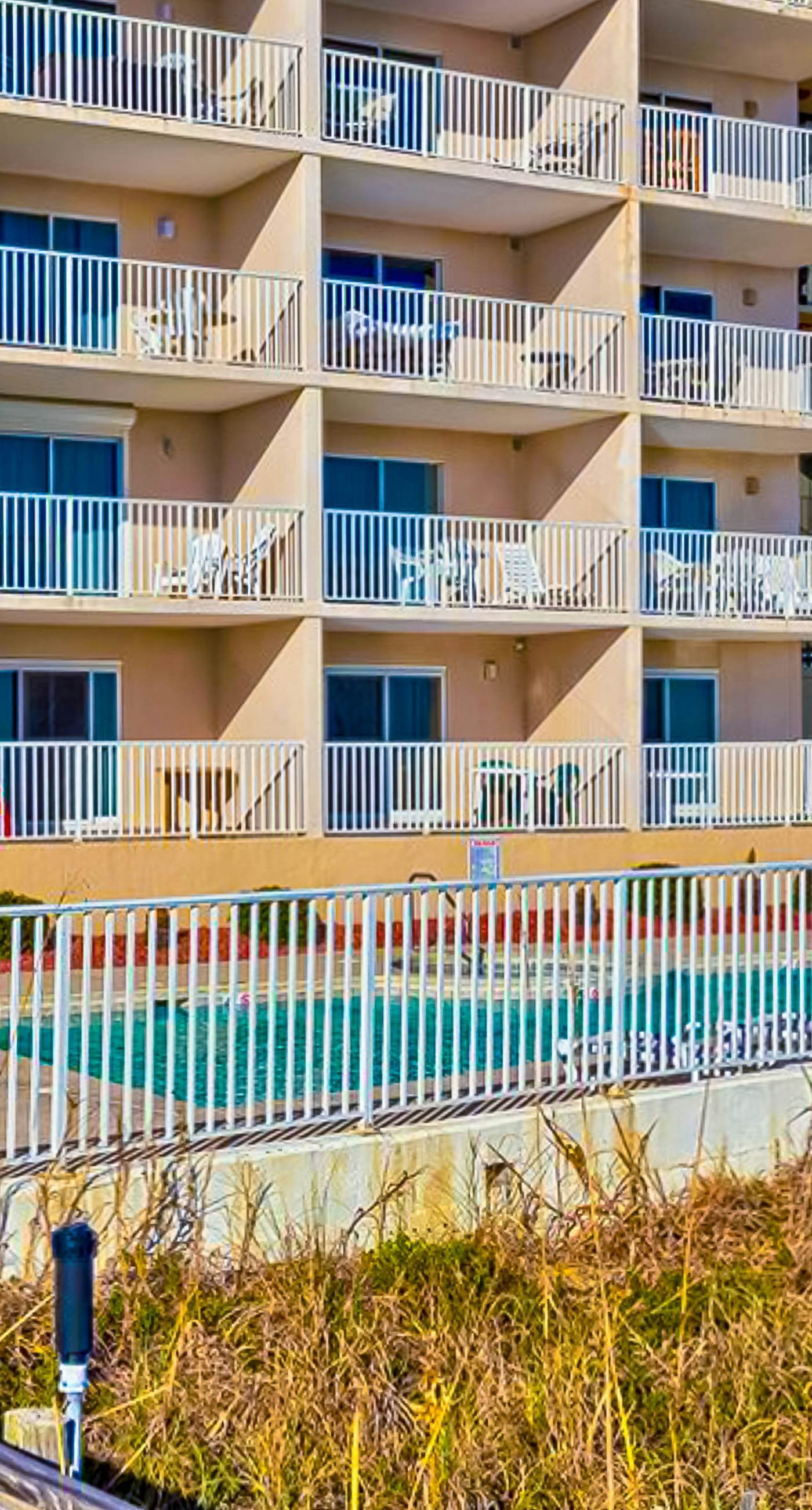 Gulf-front condo with beach access, private balcony, hot tub, pools & BBQ