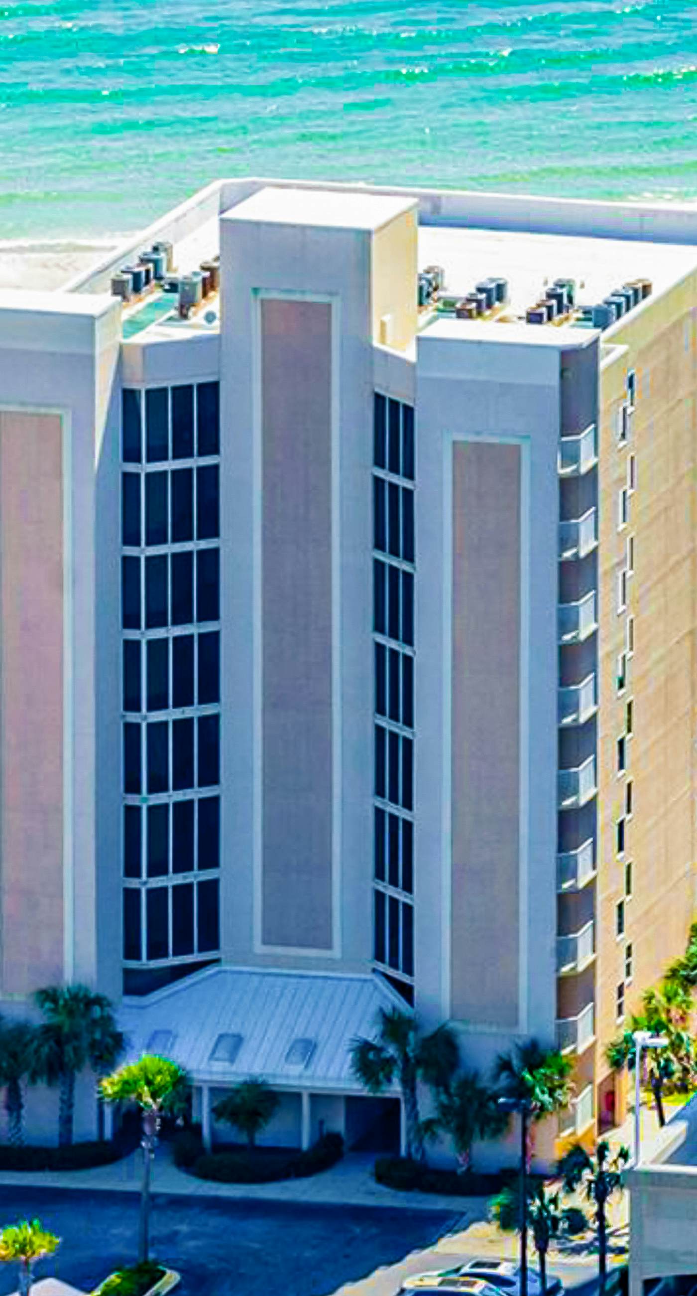 Gulf-front condo with beach access, private balcony, hot tub, pools & BBQ