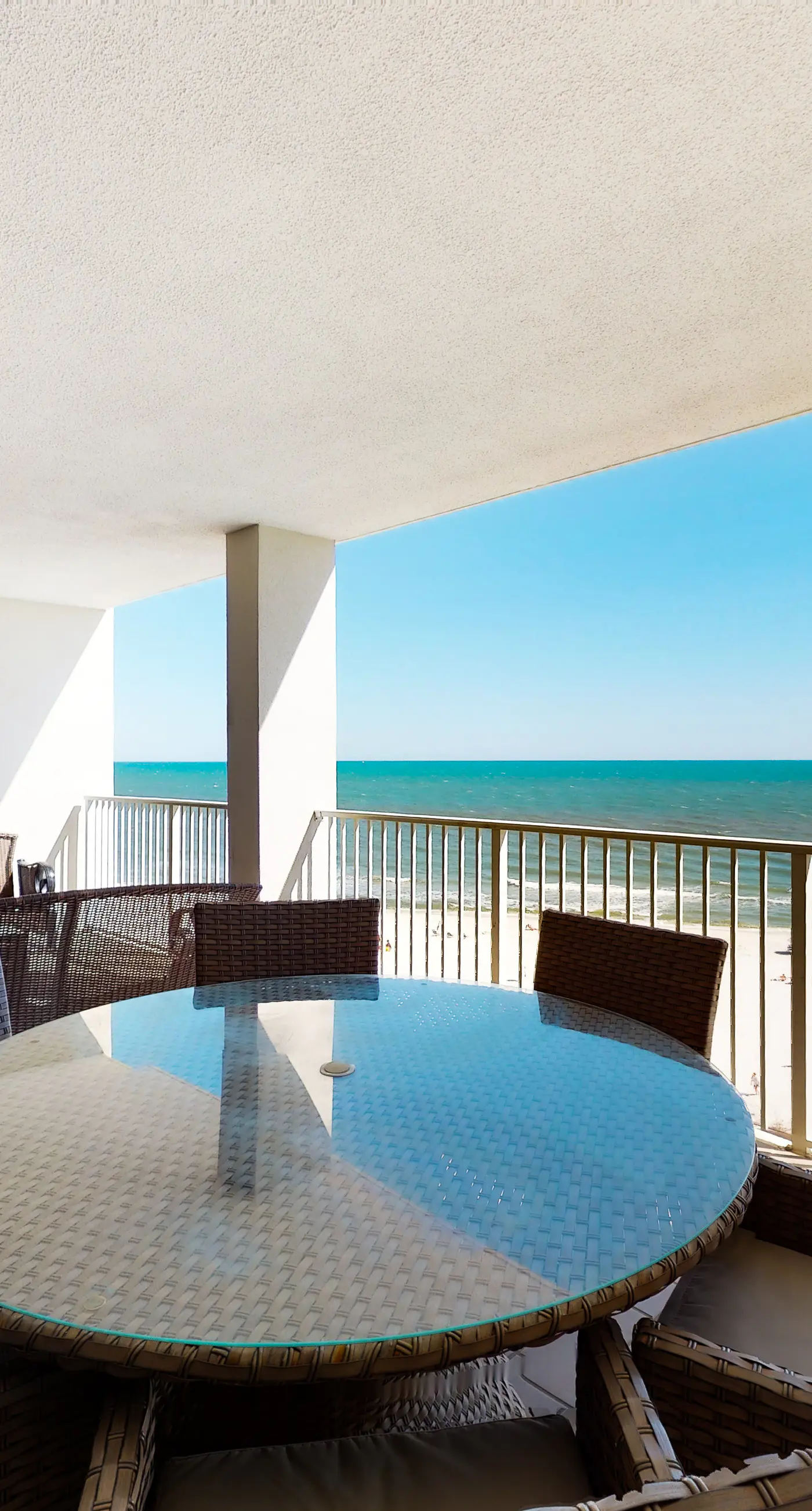 Gulf-front condo with shaded deck, AC, pools, hot tub, tennis & Gym
