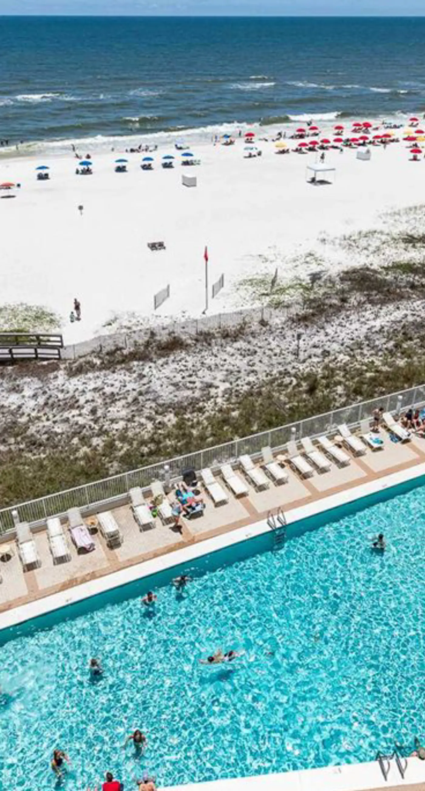 Gulf-front condo with shaded deck, AC, pools, hot tub, tennis & Gym