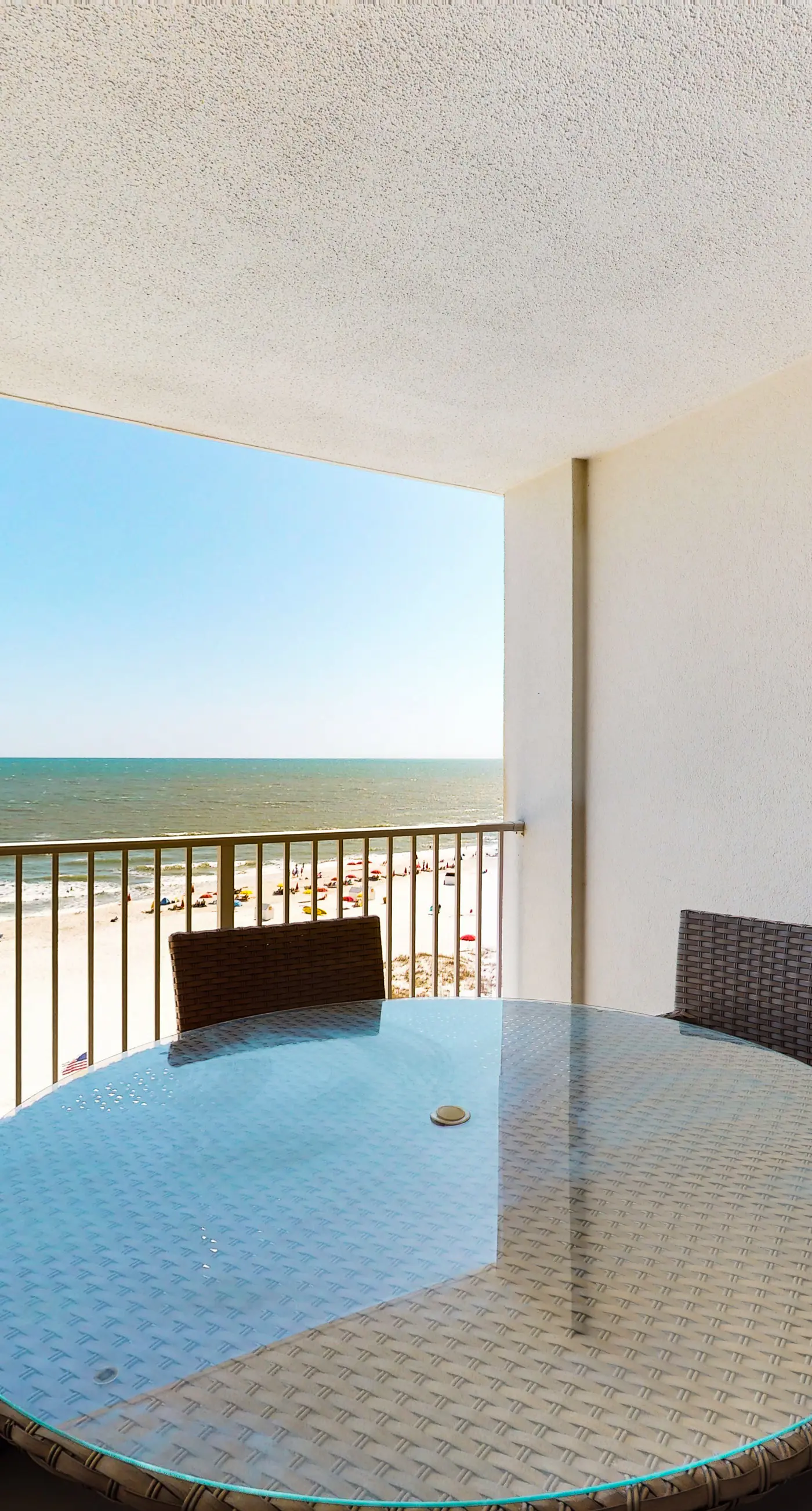 Gulf-front condo with shaded deck, AC, pools, hot tub, tennis & Gym
