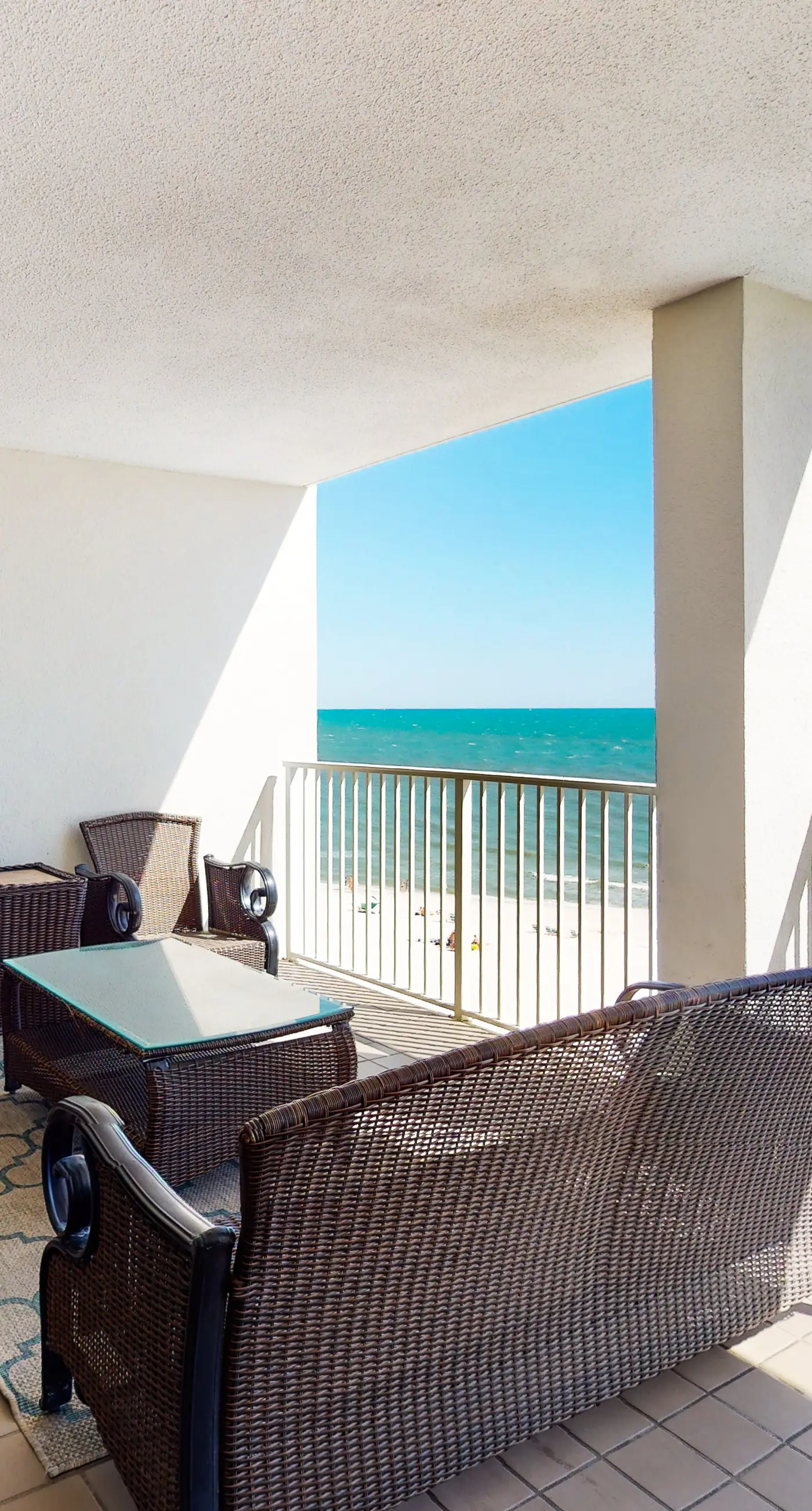 Gulf-front condo with shaded deck, AC, pools, hot tub, tennis & Gym