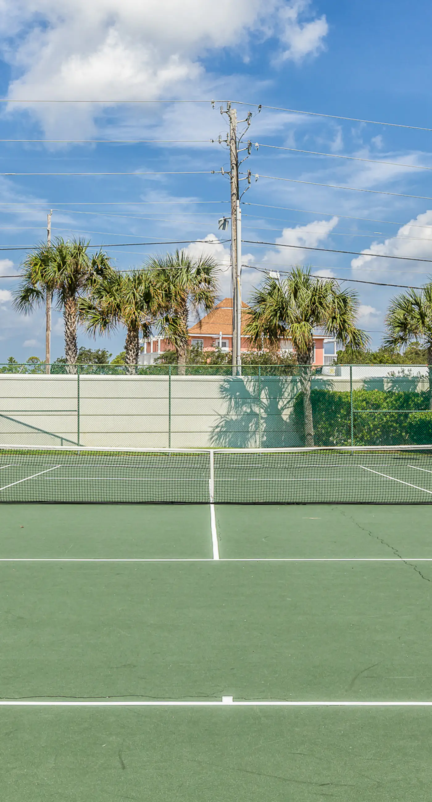 Gulf-front condo with shaded deck, AC, pools, hot tub, tennis & Gym