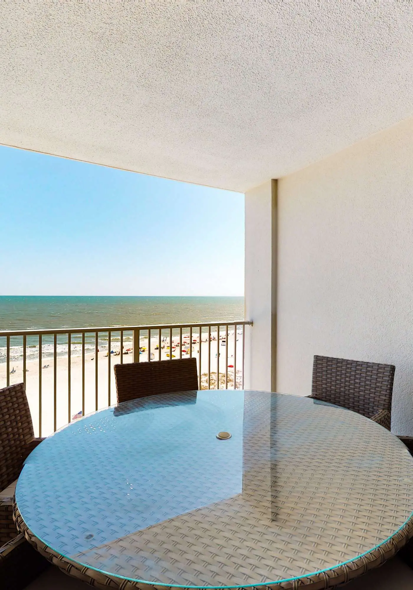 Gulf-front condo with shaded deck, AC, pools, hot tub, tennis & Gym