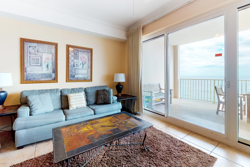 Beachfront condo with Gulf view, balcony, pools, hot tubs & gym access