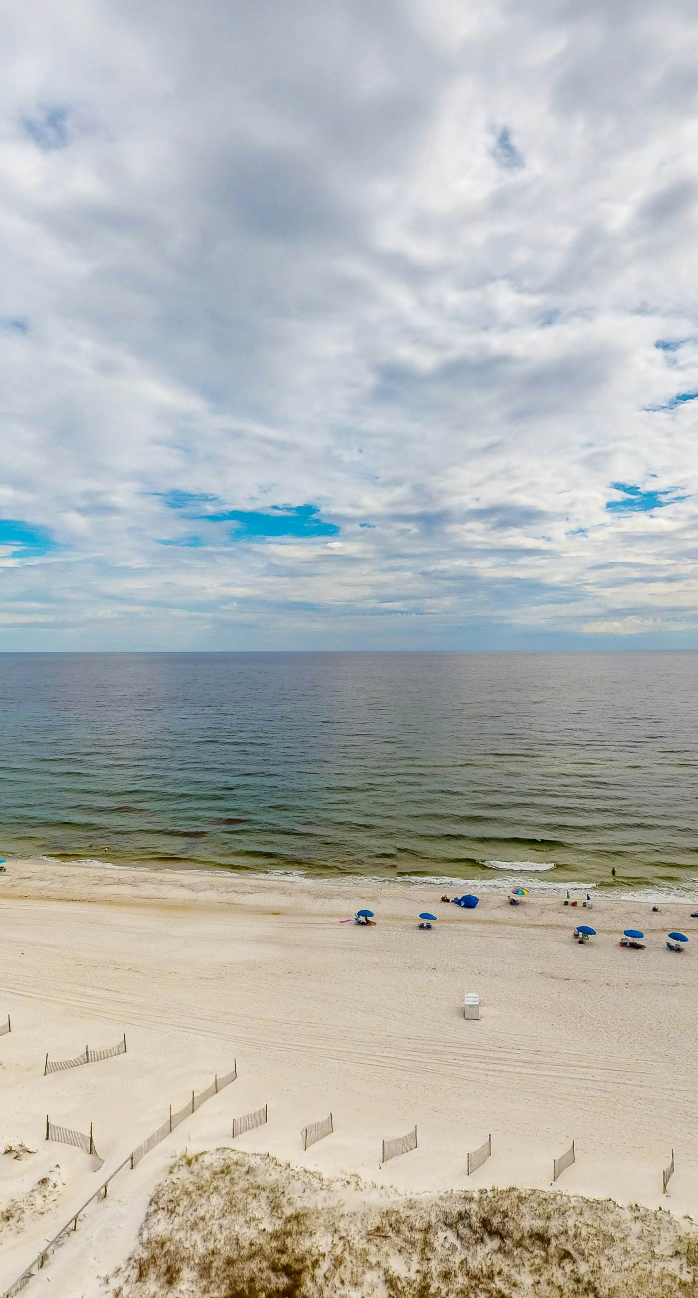 Beachfront condo with Gulf view, balcony, pools, hot tubs & gym access