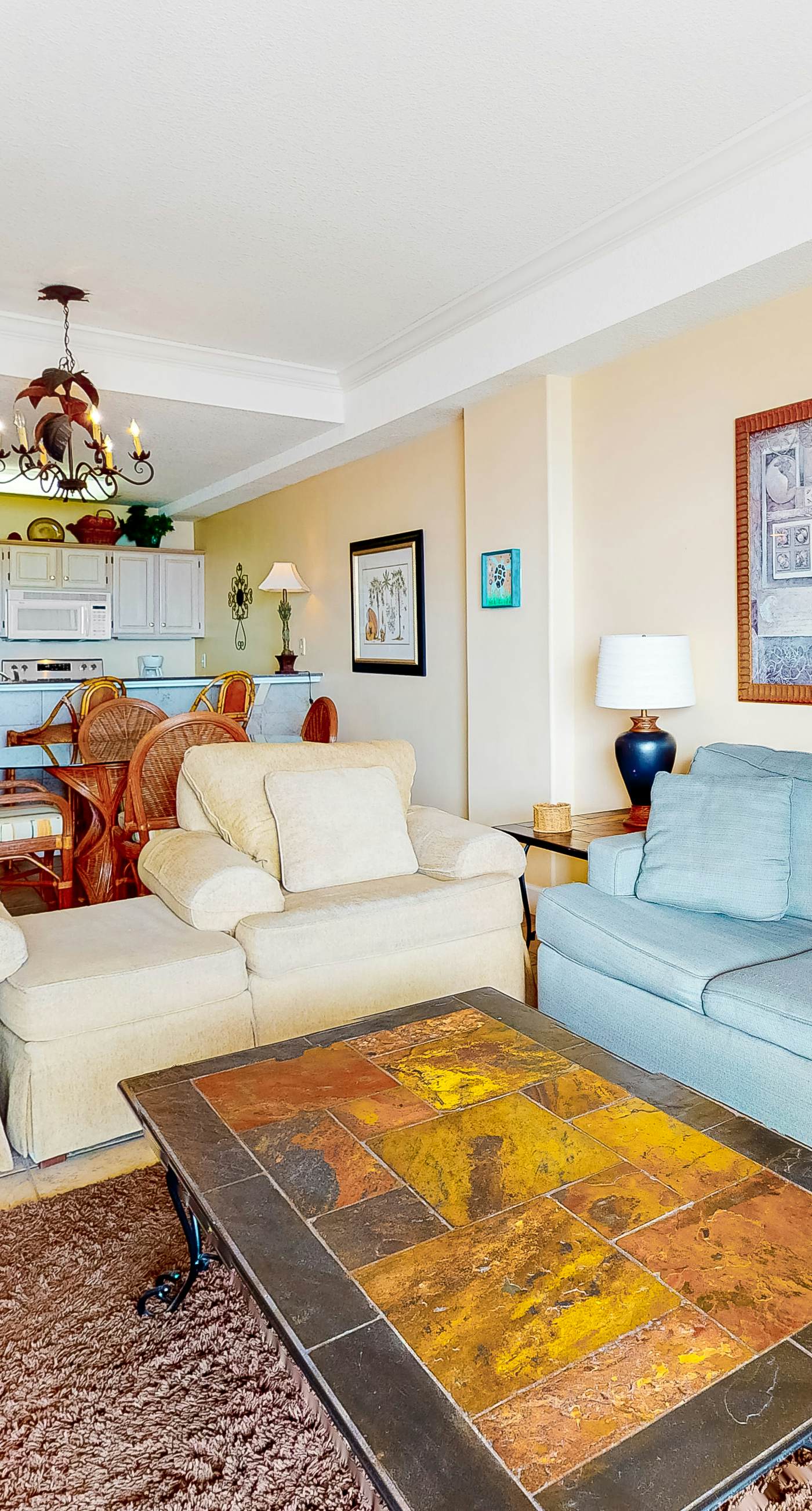 Beachfront condo with Gulf view, balcony, pools, hot tubs & gym access