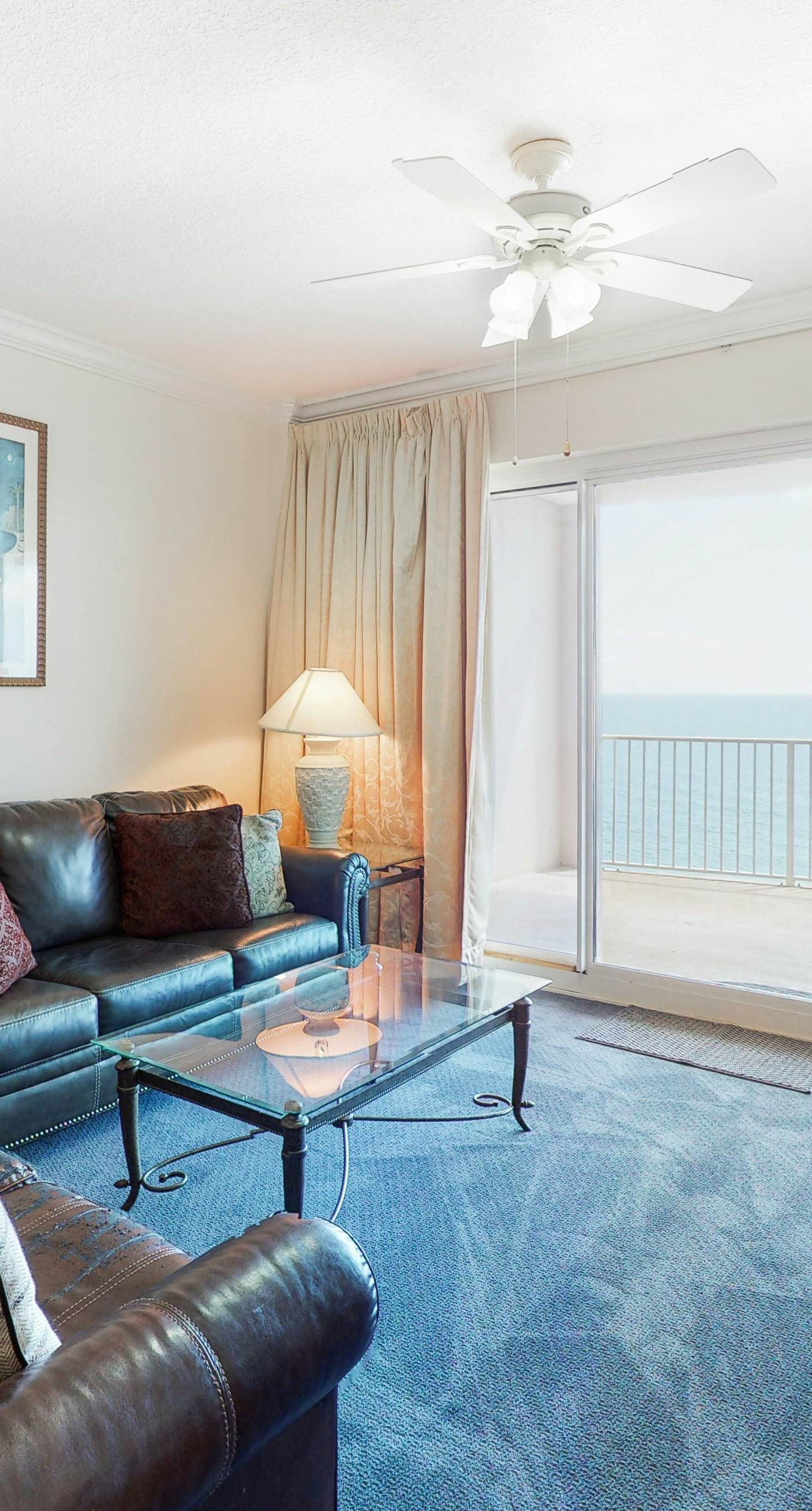 Gulf-front condo with shaded balcony, pools, hot tubs, gym & beach access