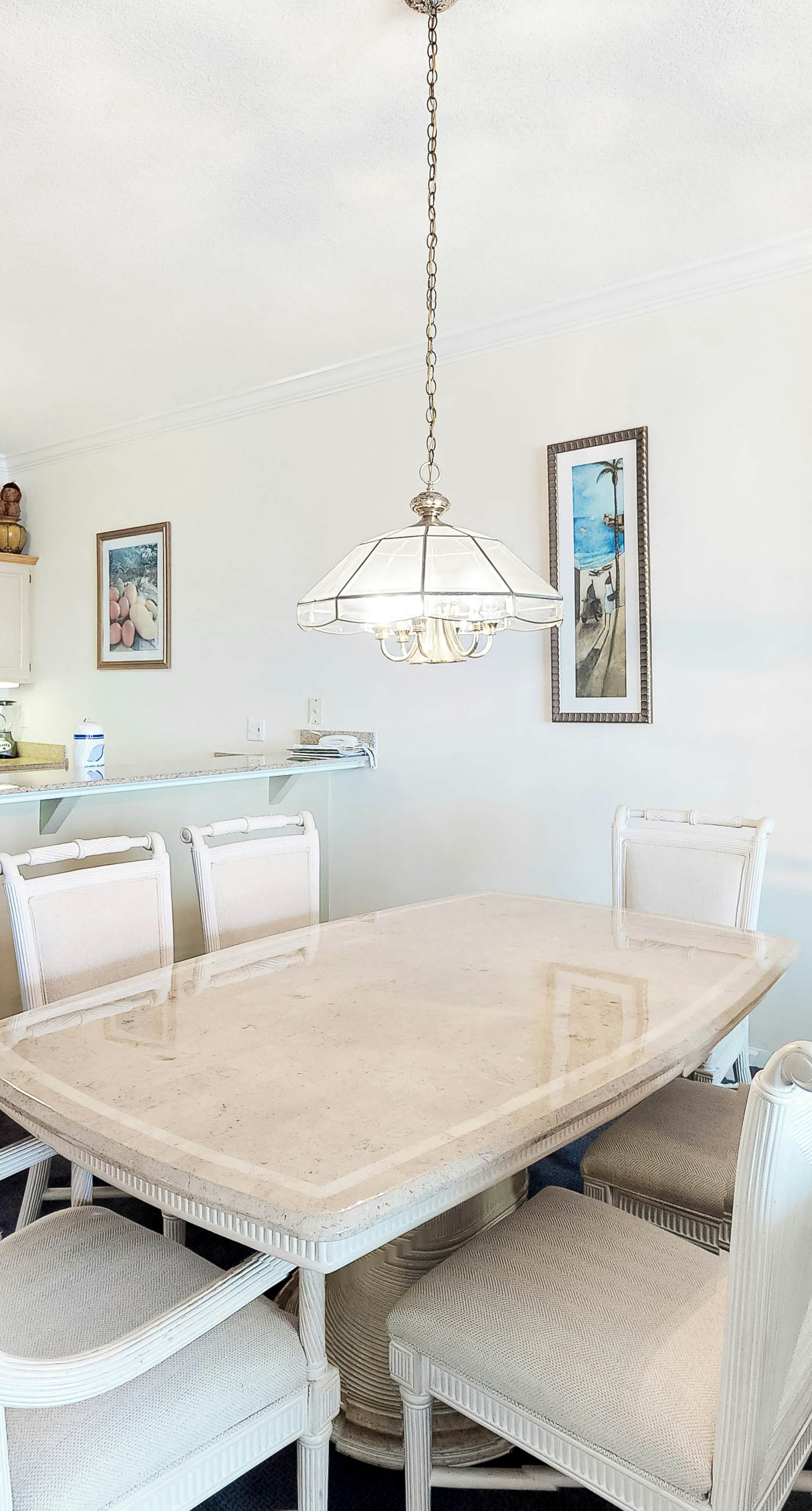 Gulf-front condo with shaded balcony, pools, hot tubs, gym & beach access