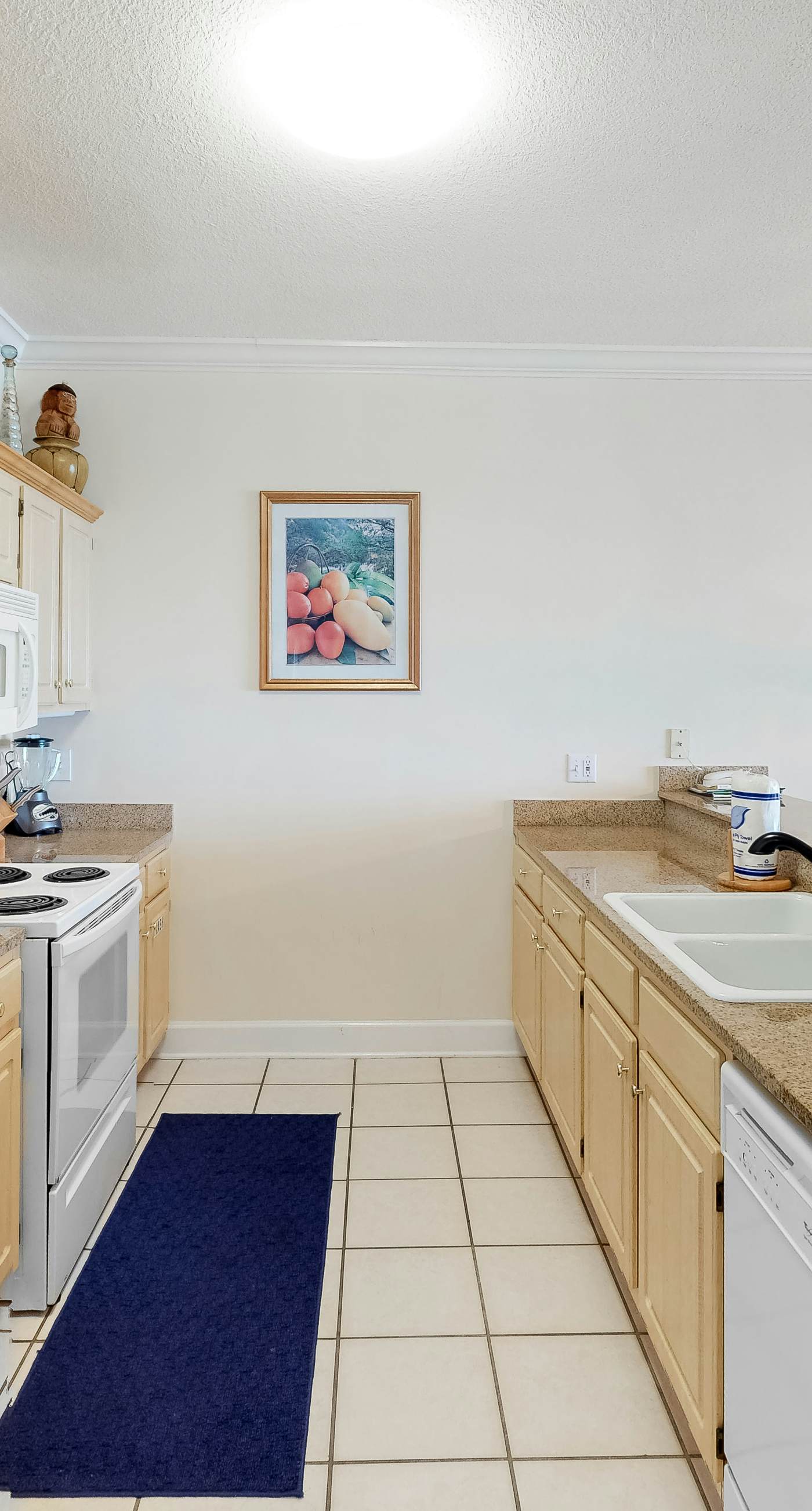 Gulf-front condo with shaded balcony, pools, hot tubs, gym & beach access