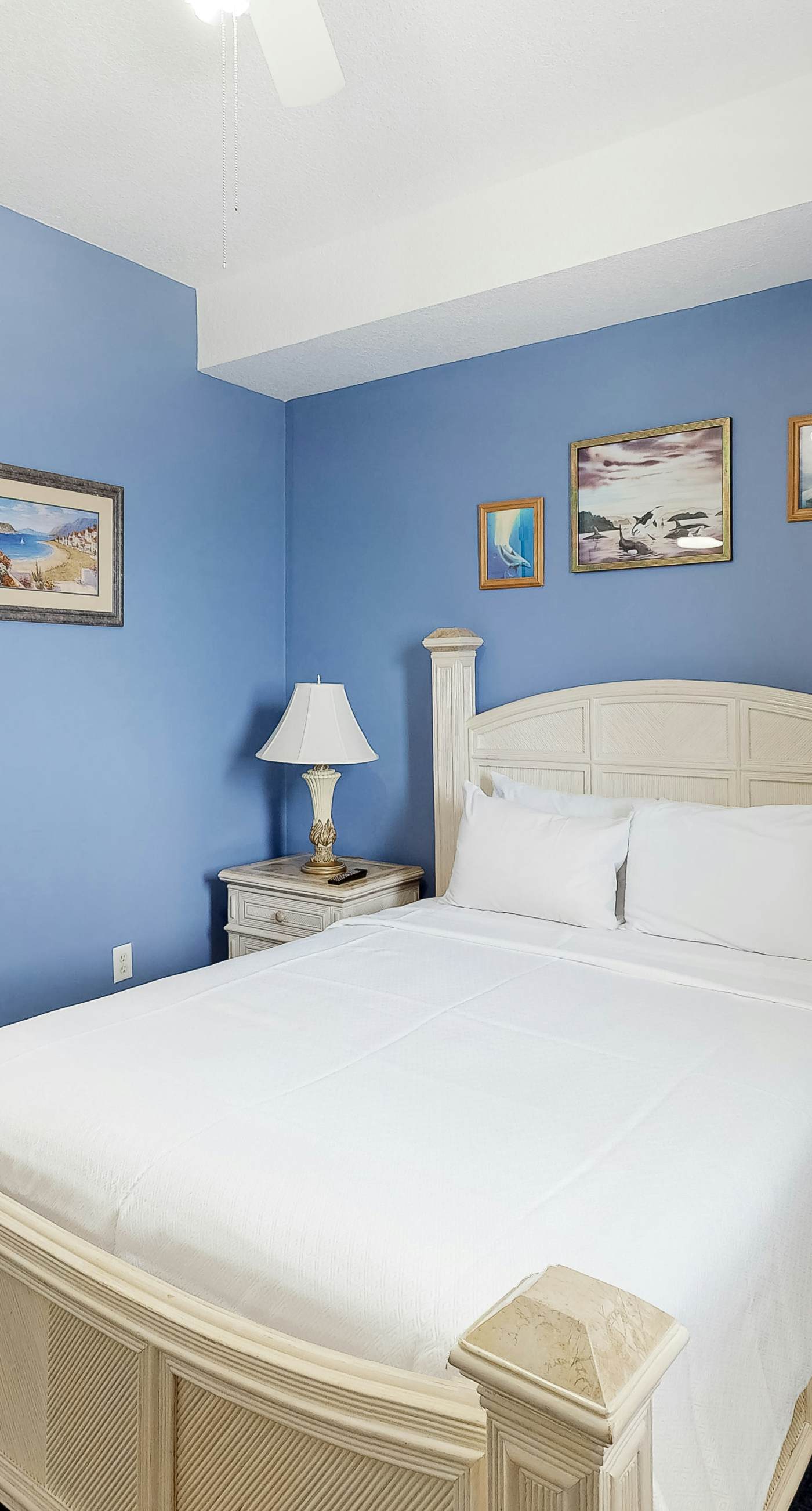 Gulf-front condo with shaded balcony, pools, hot tubs, gym & beach access