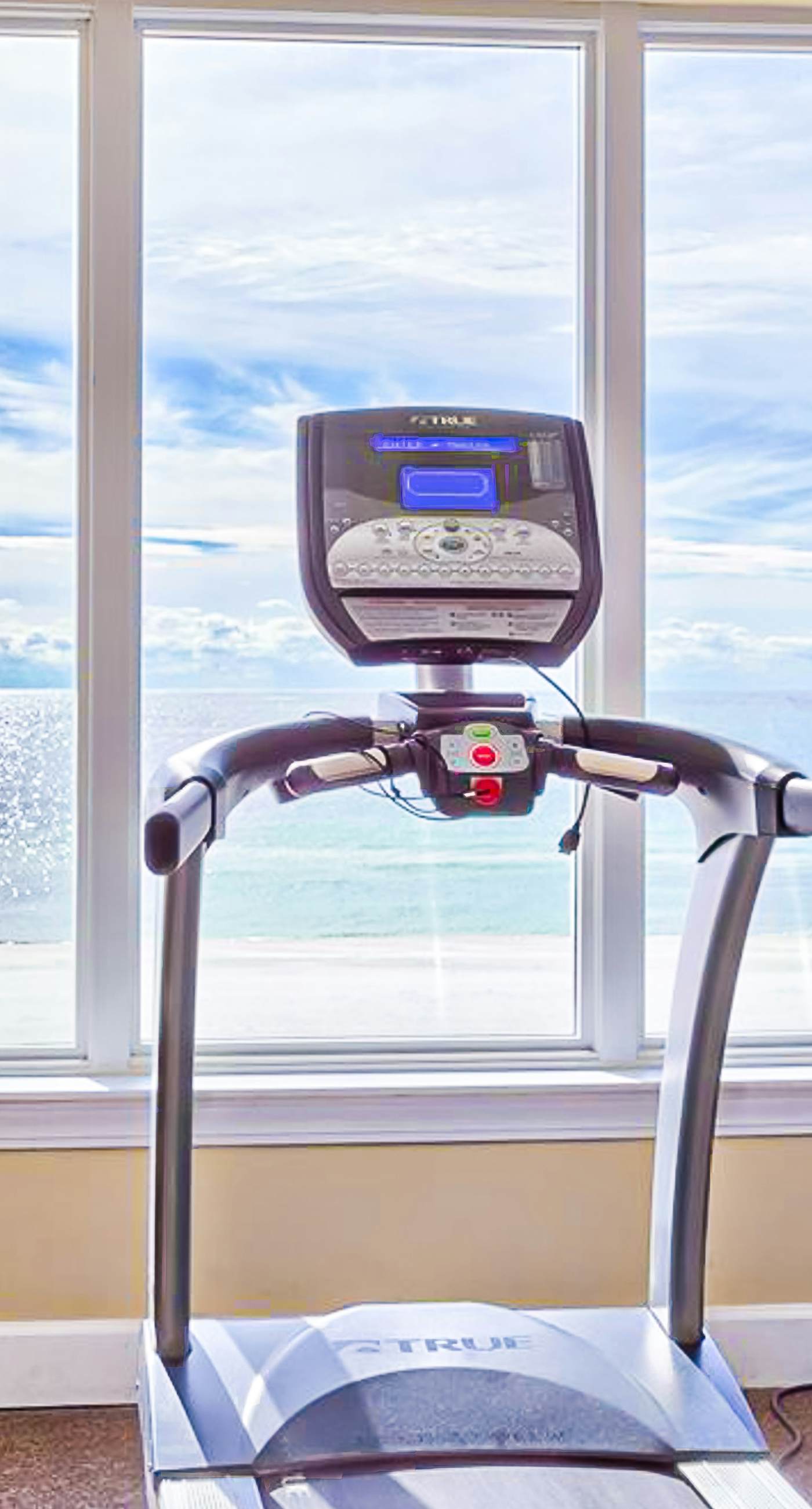 Gulf-front condo with shaded balcony, pools, hot tubs, gym & beach access