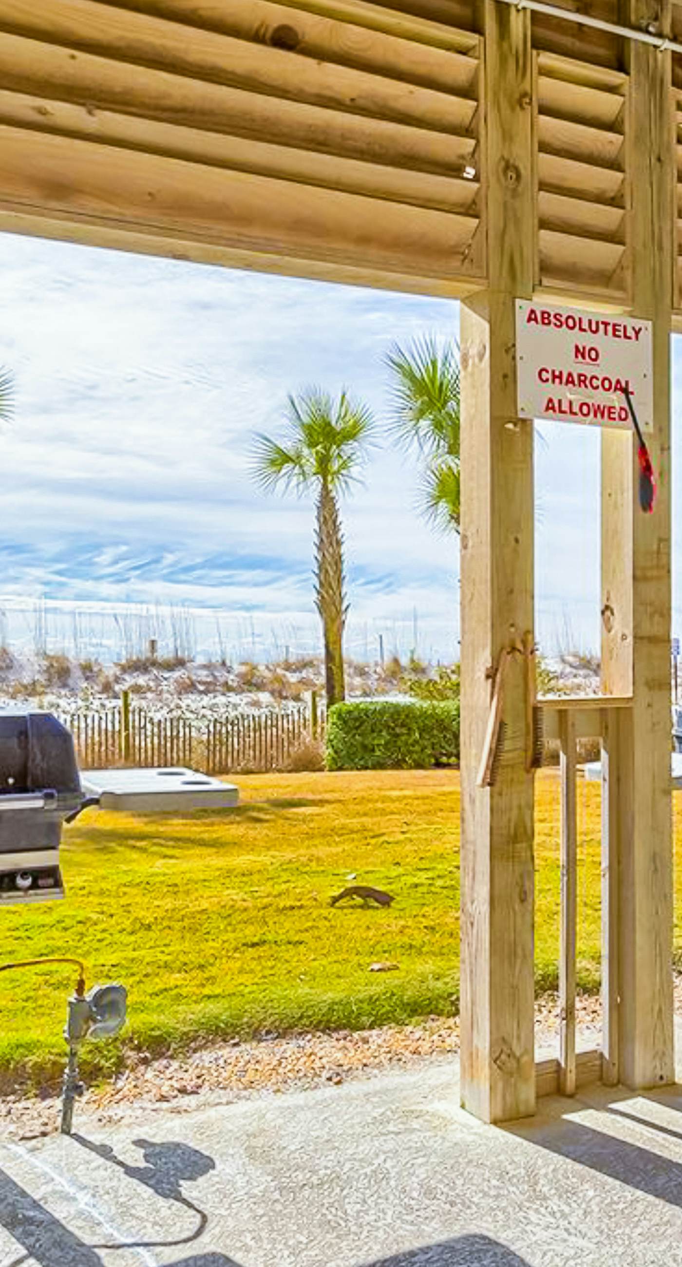 Gulf-front condo with shaded balcony, pools, hot tubs, gym & beach access