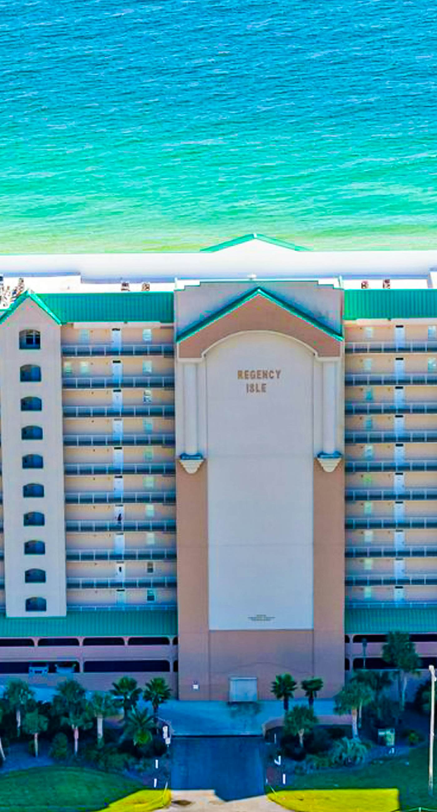 Gulf-front condo with shaded balcony, pools, hot tubs, gym & beach access