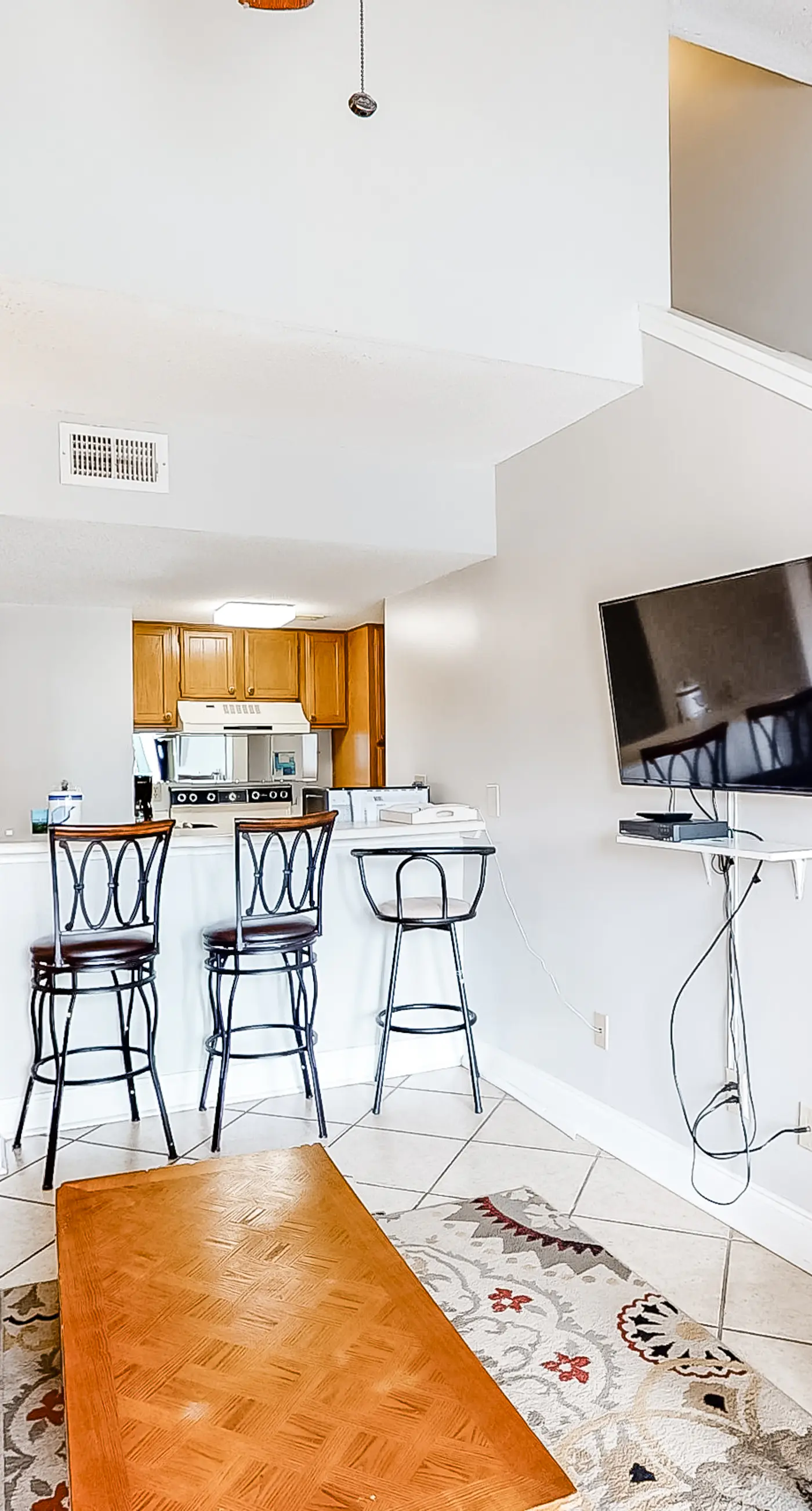 Bright resort condo with pool access, cozy patio, plus a washer/dryer