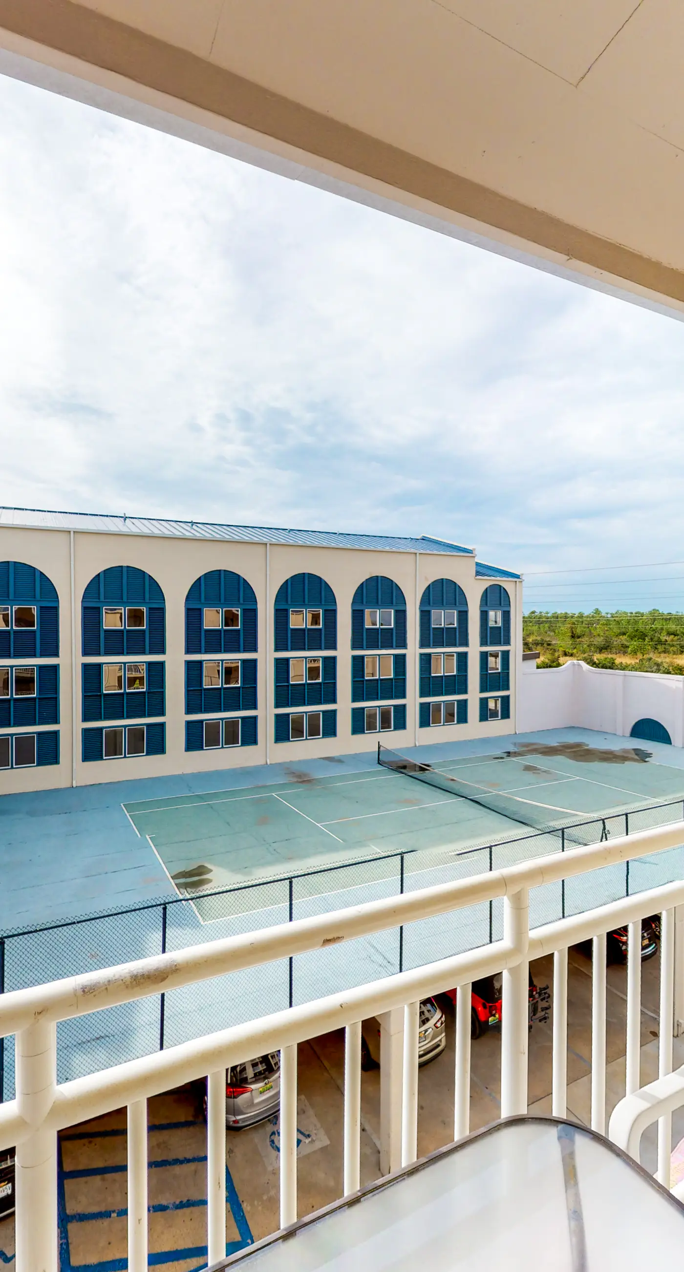 Bright resort condo with pool access, cozy patio, plus a washer/dryer