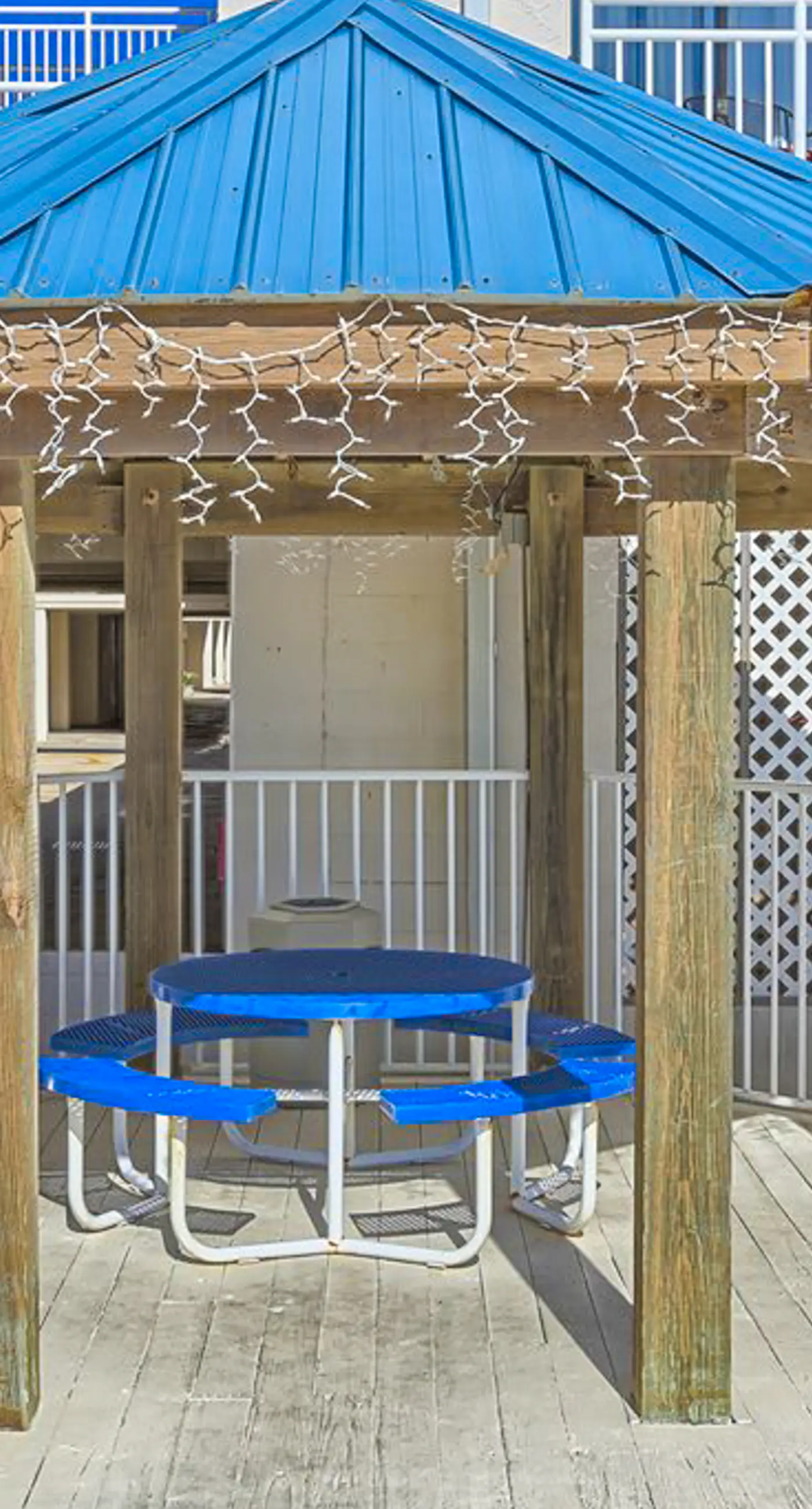 Bright resort condo with pool access, cozy patio, plus a washer/dryer