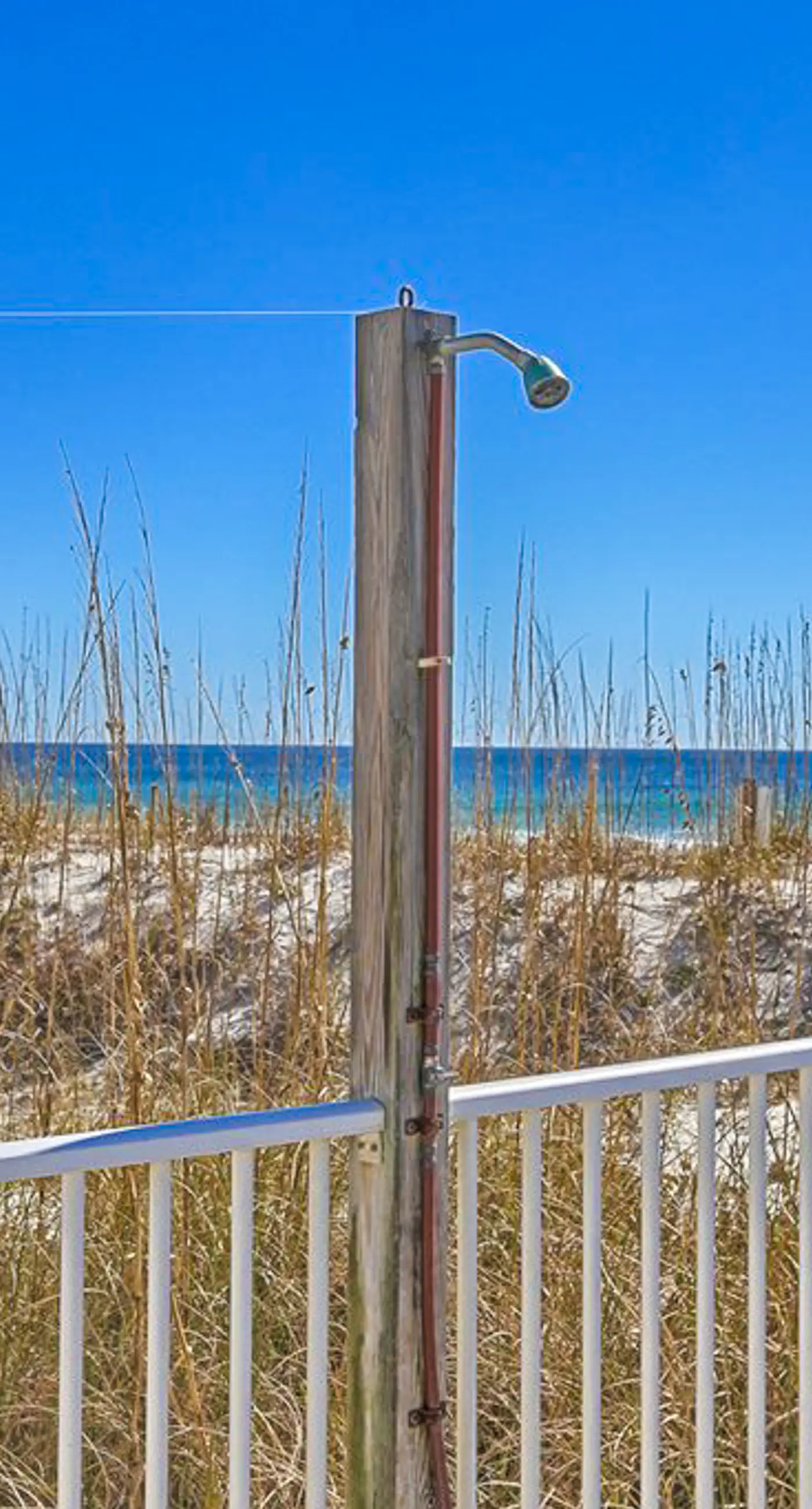 Bright resort condo with pool access, cozy patio, plus a washer/dryer