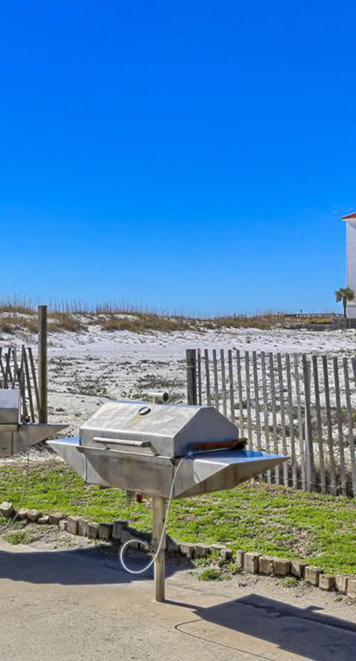 Bright resort condo with pool access, cozy patio, plus a washer/dryer