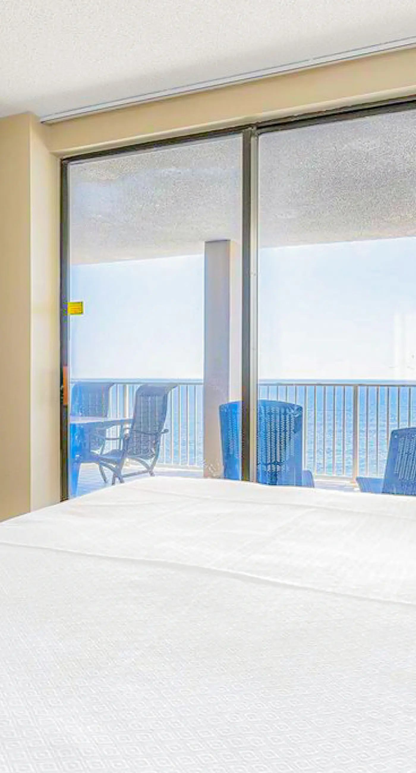 Gulf-front 15th-floor condo with balcony, pools, hot tub, AC, beach views, gym