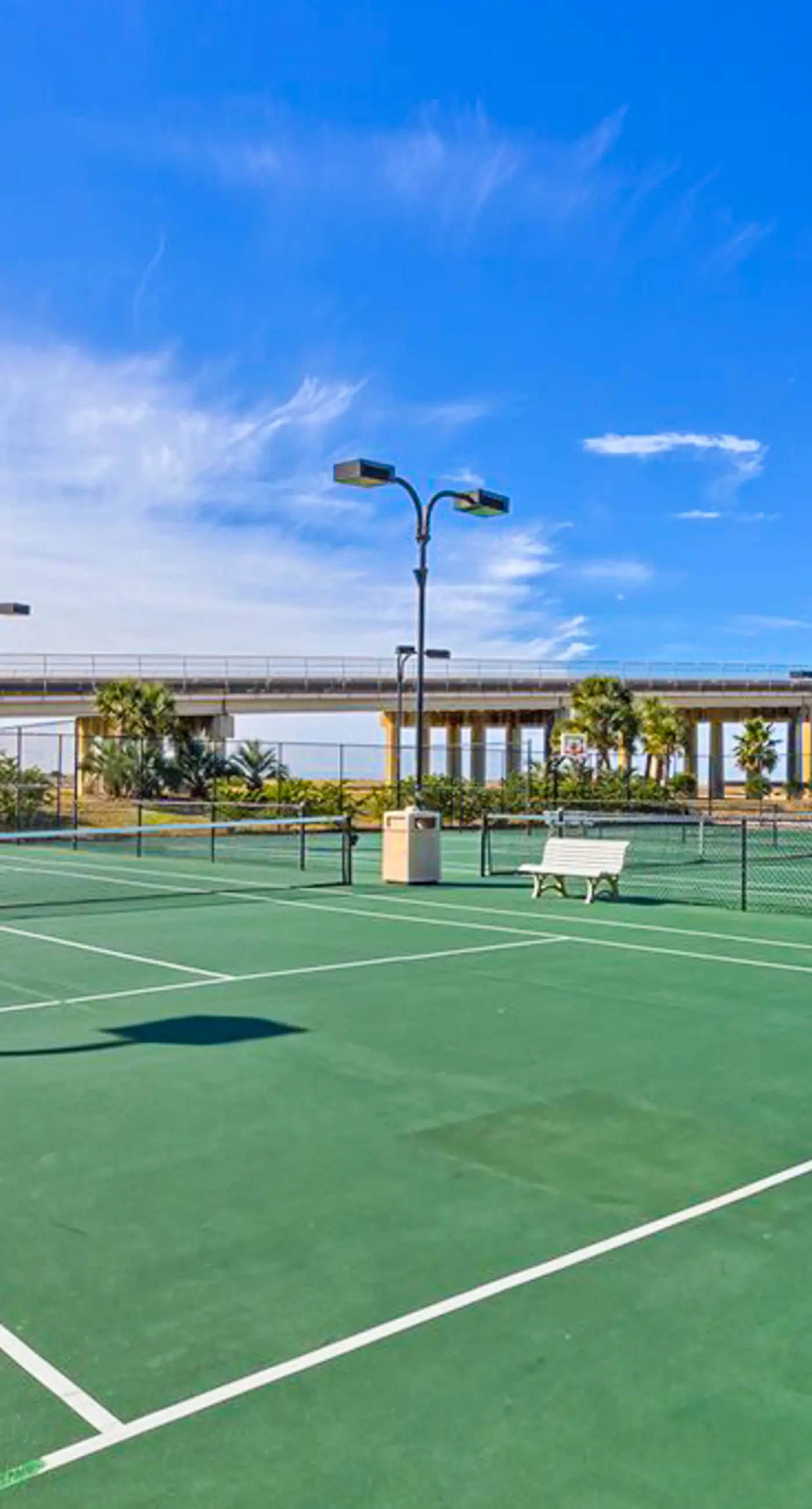 Beachfront 13th-floor condo with balcony, hot tubs, pools, & tennis courts