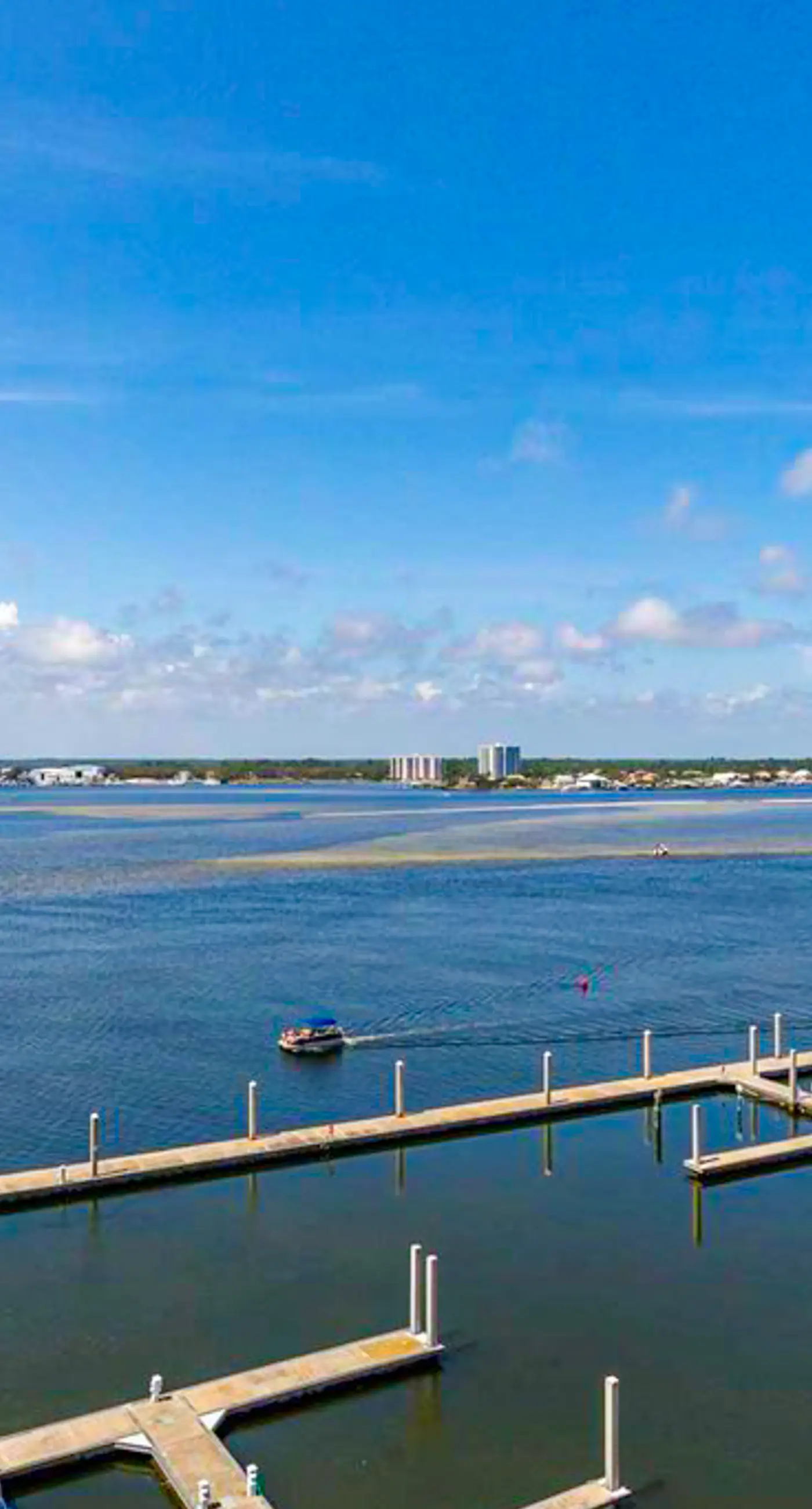 Beachfront 13th-floor condo with balcony, hot tubs, pools, & tennis courts