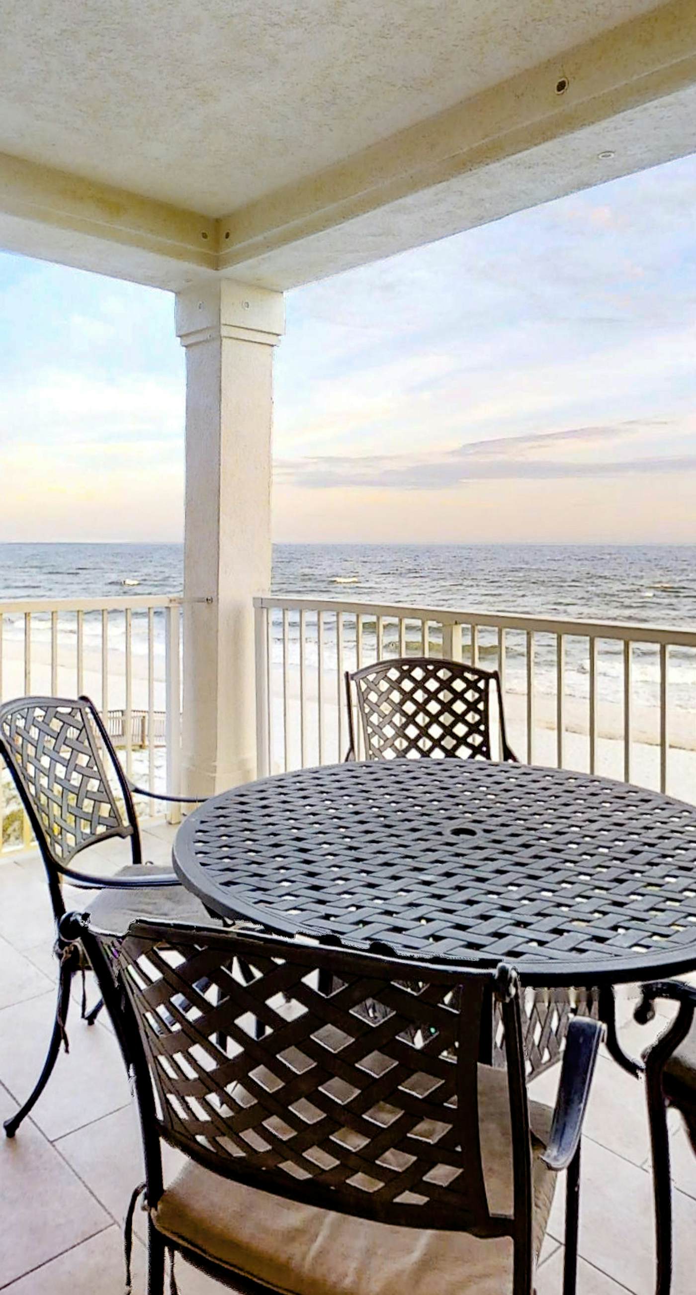 Gulf-Front condo with balcony, beach access, WiFi, AC, & outdoor pool