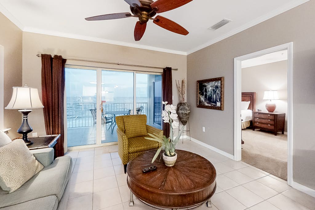 Gulf-Front condo with balcony, beach access, WiFi, AC, & outdoor pool